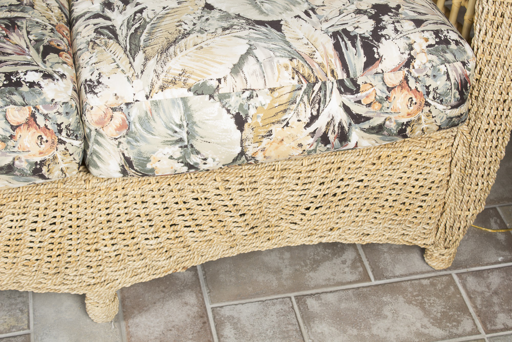 BenchCraft Wicker Patio Sofa with Floral Cushions