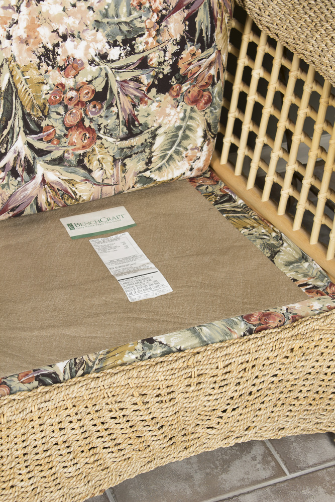 BenchCraft Wicker Patio Sofa with Floral Cushions