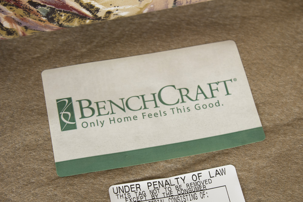 BenchCraft Wicker Patio Sofa with Floral Cushions