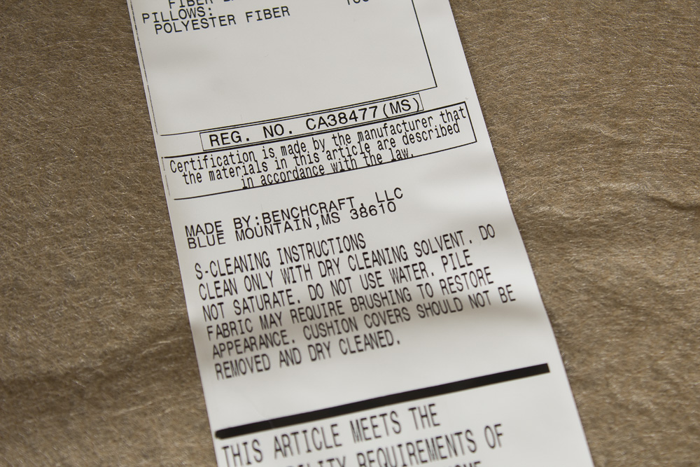 BenchCraft Wicker Patio Sofa with Floral Cushions