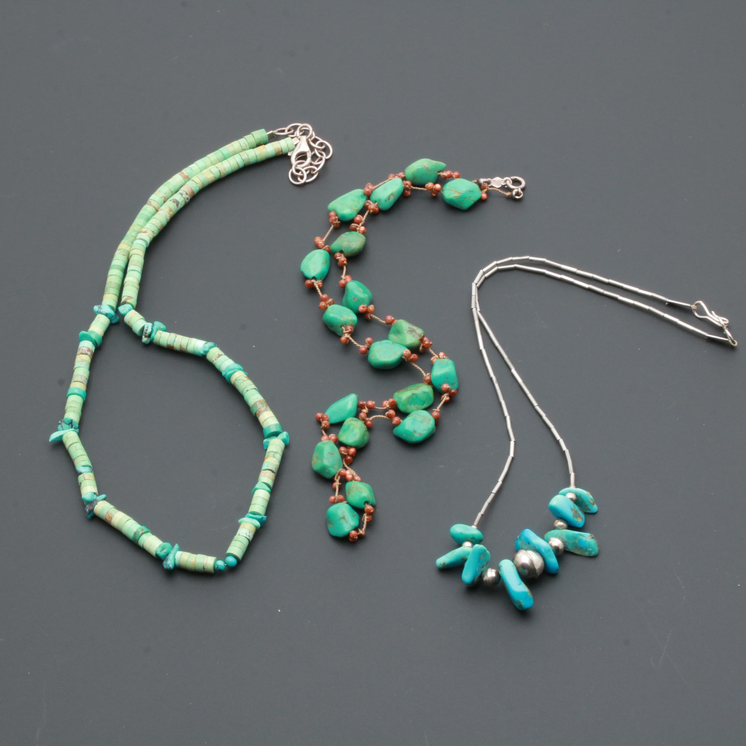 Assortment of Gemstone Necklaces Including Sterling Silver and Amber