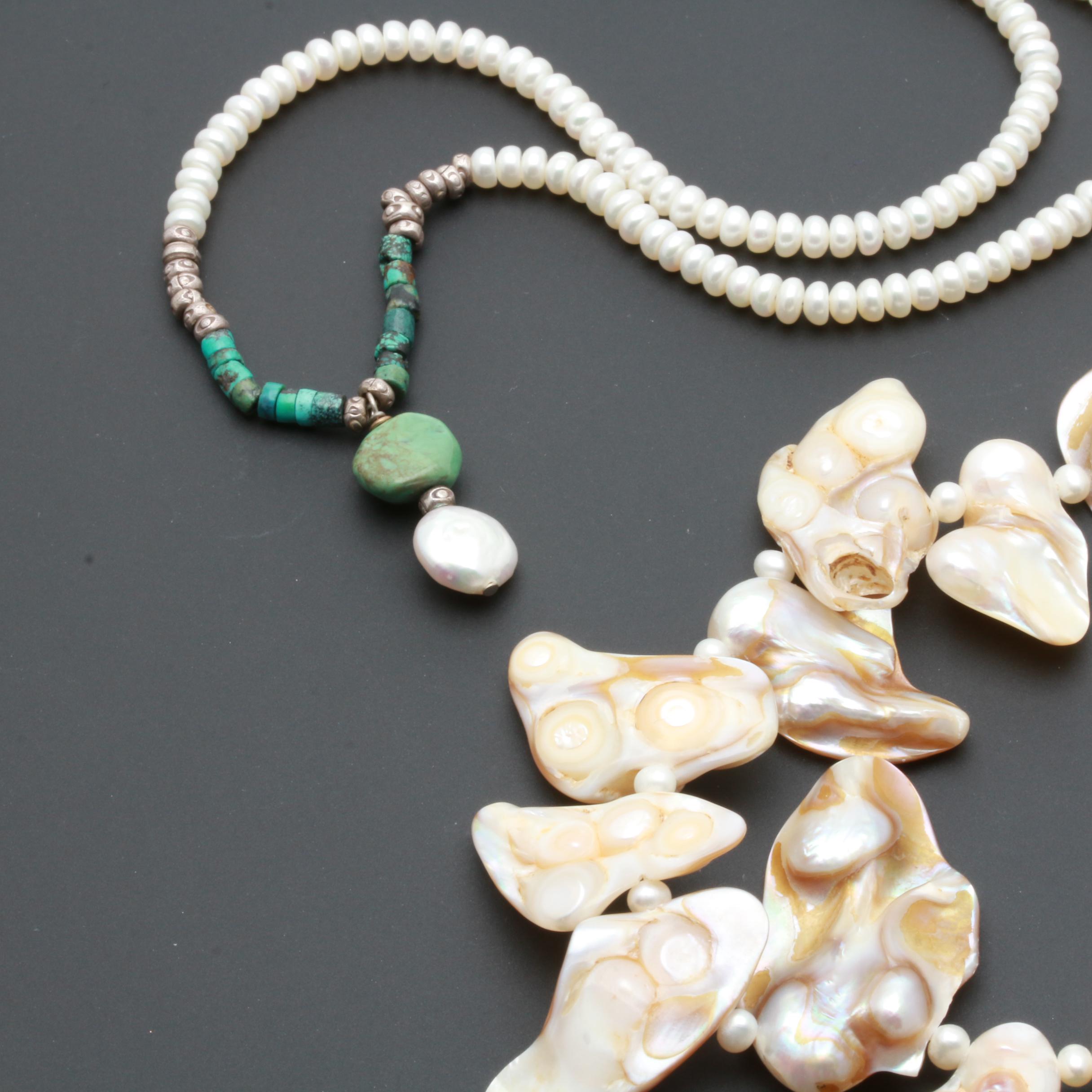 Assortment of Gemstone Necklaces Including Sterling Silver and Amber