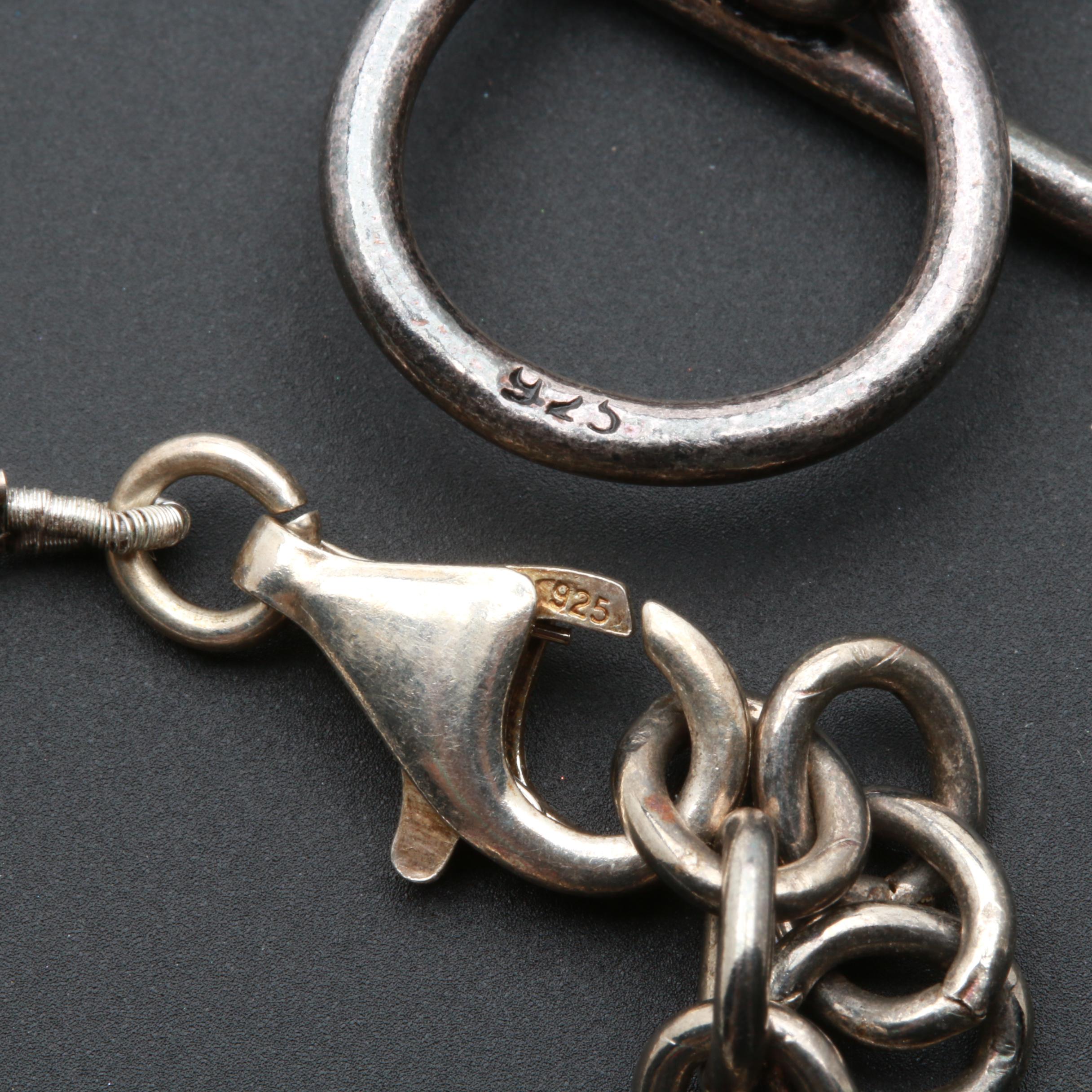 Assortment of Gemstone Necklaces Including Sterling Silver and Amber