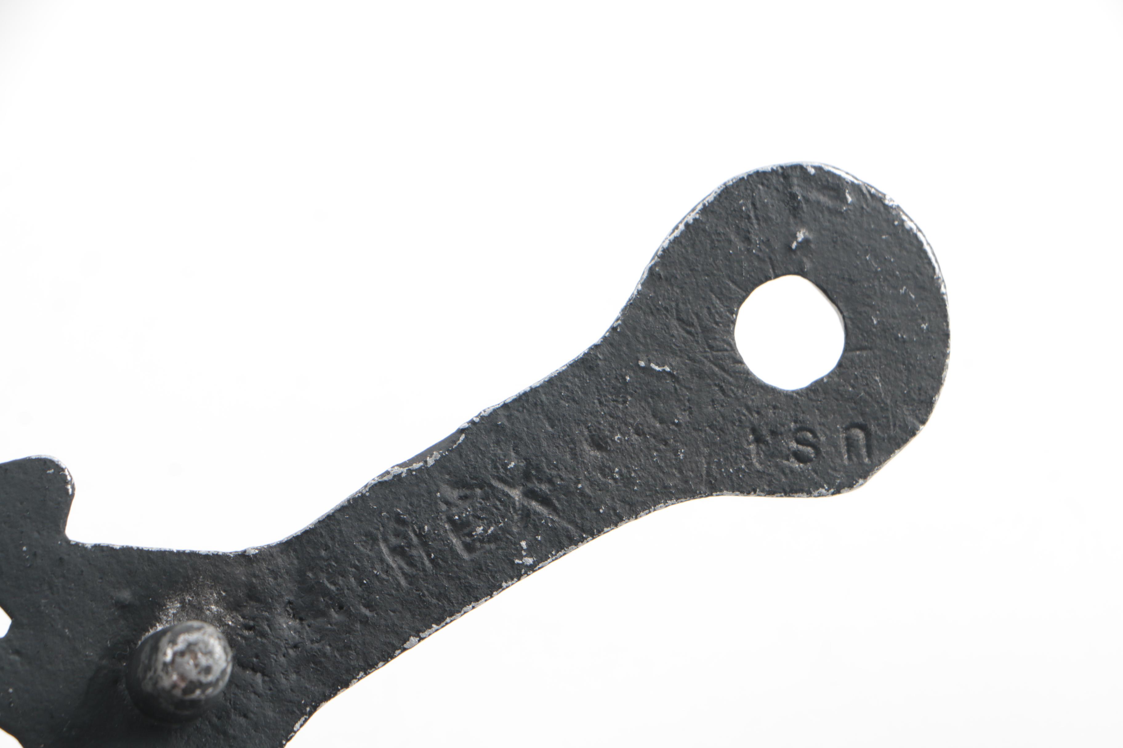 Vintage and Contemporary Iron Trivets Featuring Sexton