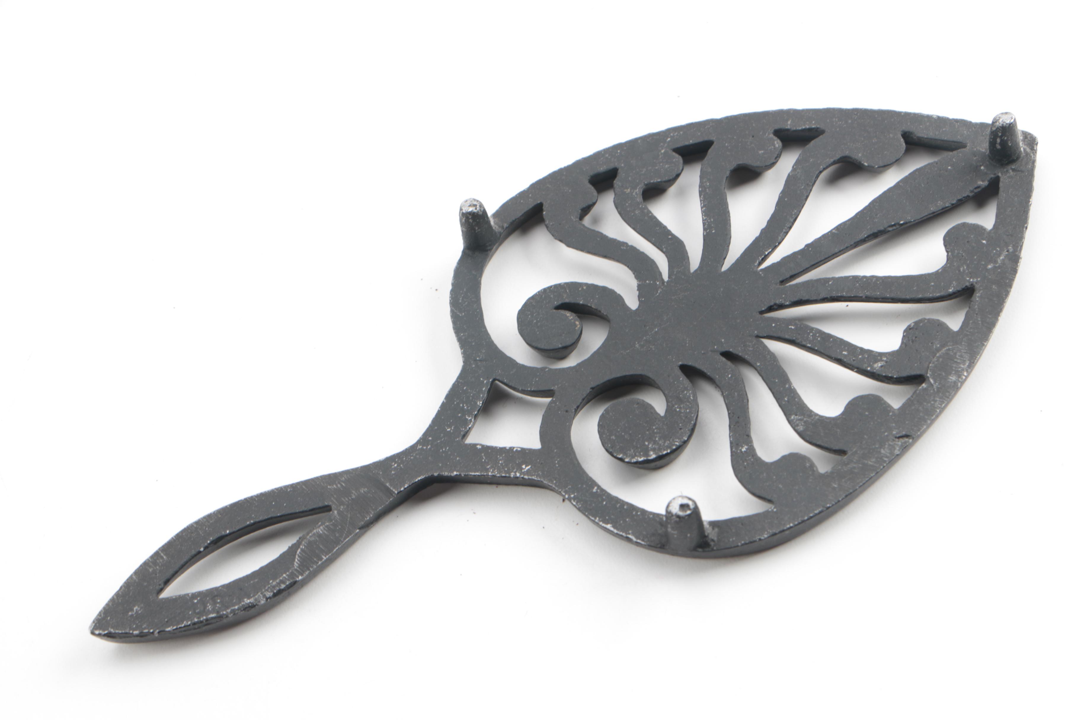 Vintage and Contemporary Iron Trivets Featuring Sexton
