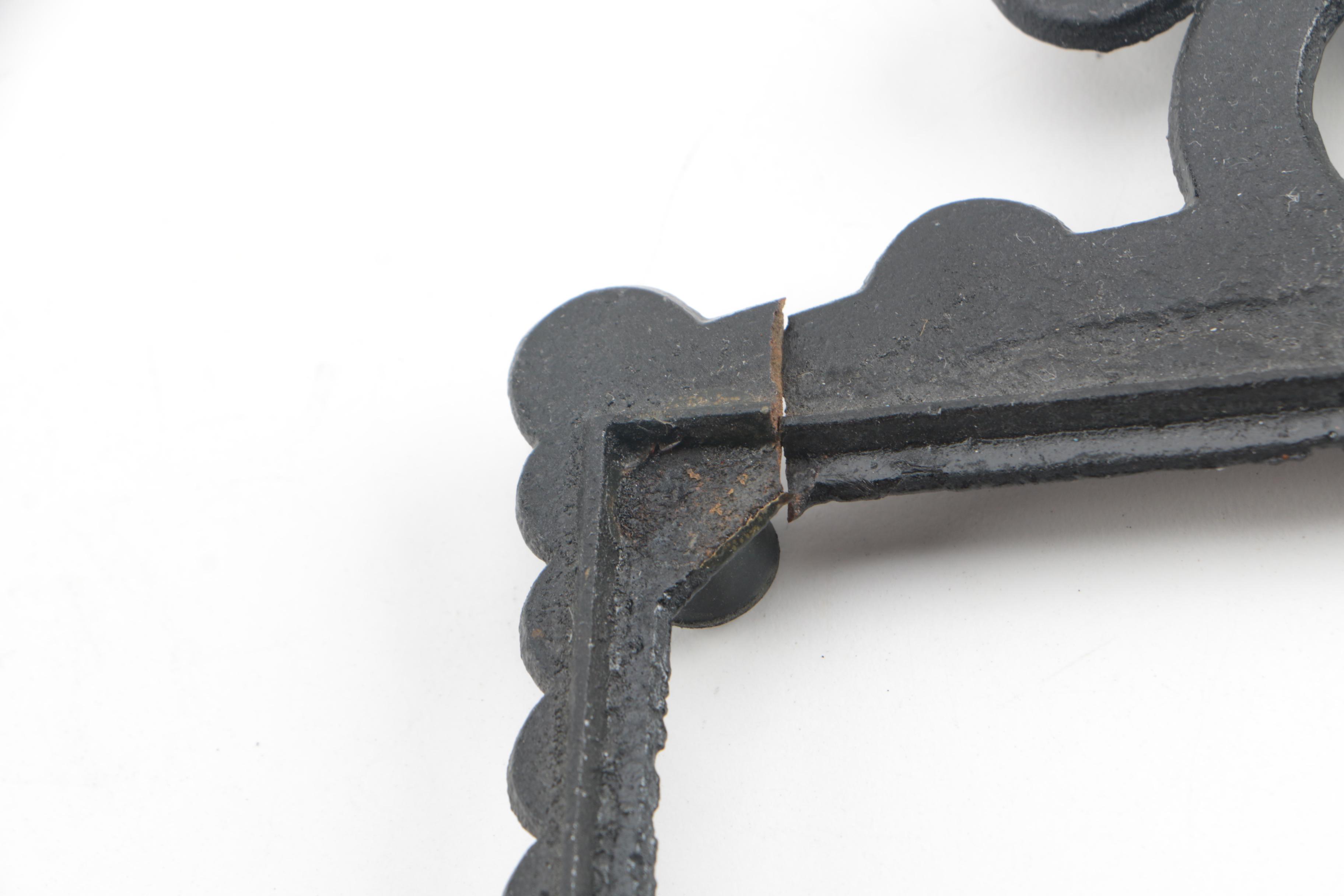 Vintage and Contemporary Iron Trivets Featuring Sexton