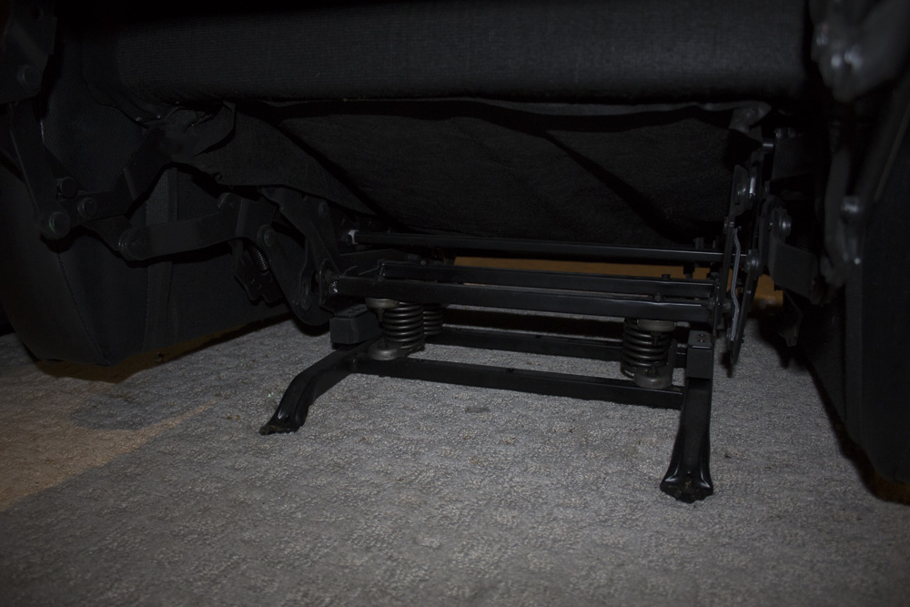 Black Faux Leather Recliner by First & Best Furniture Company