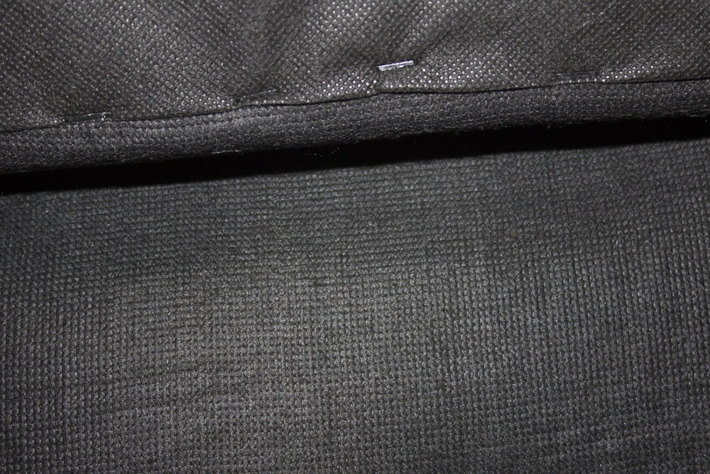 Black Faux Leather Recliner by First & Best Furniture Company