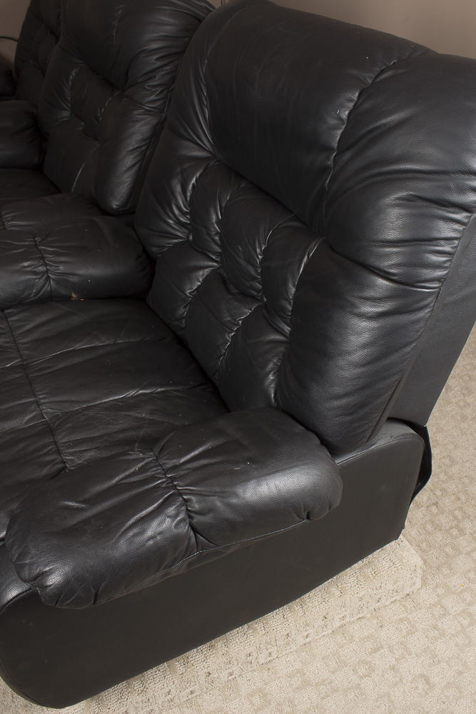 Black Faux Leather Recliner by First & Best Furniture Company