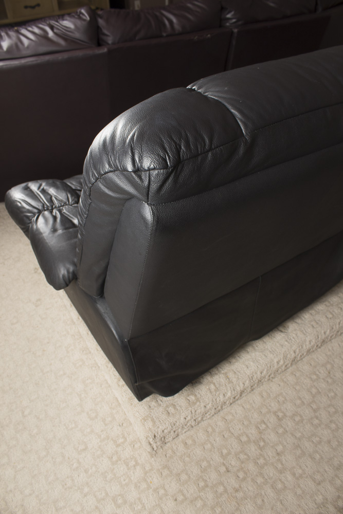 Black Faux Leather Recliner by First & Best Furniture Company