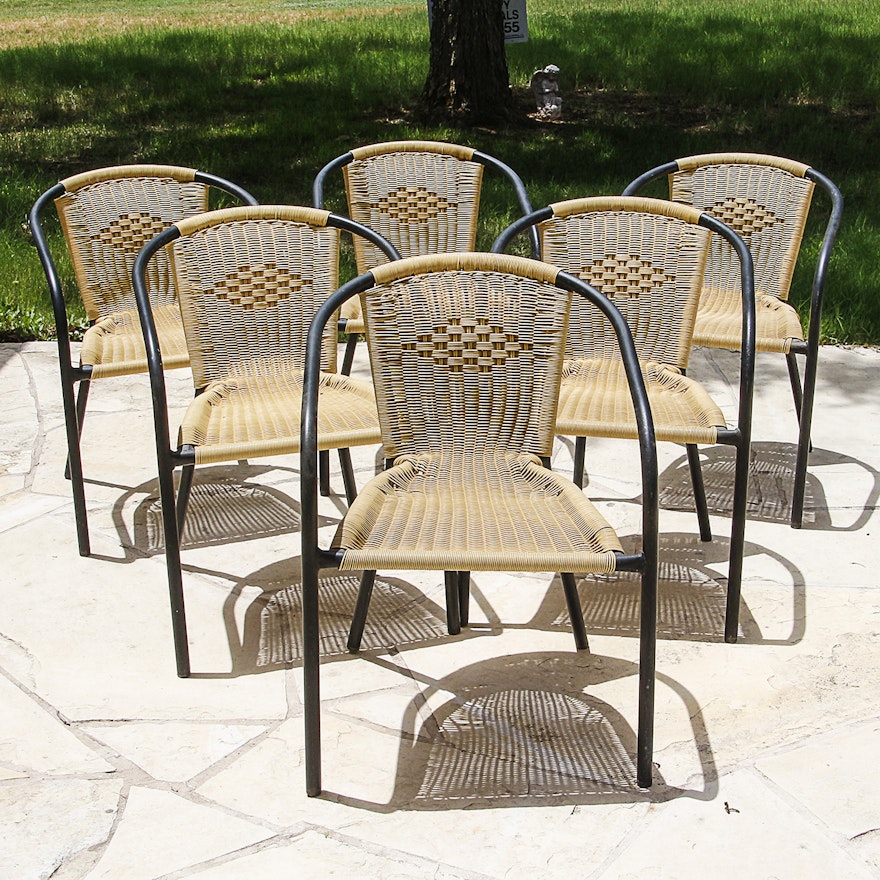 Six Metal and Wicker Woven Plastic Patio Chairs