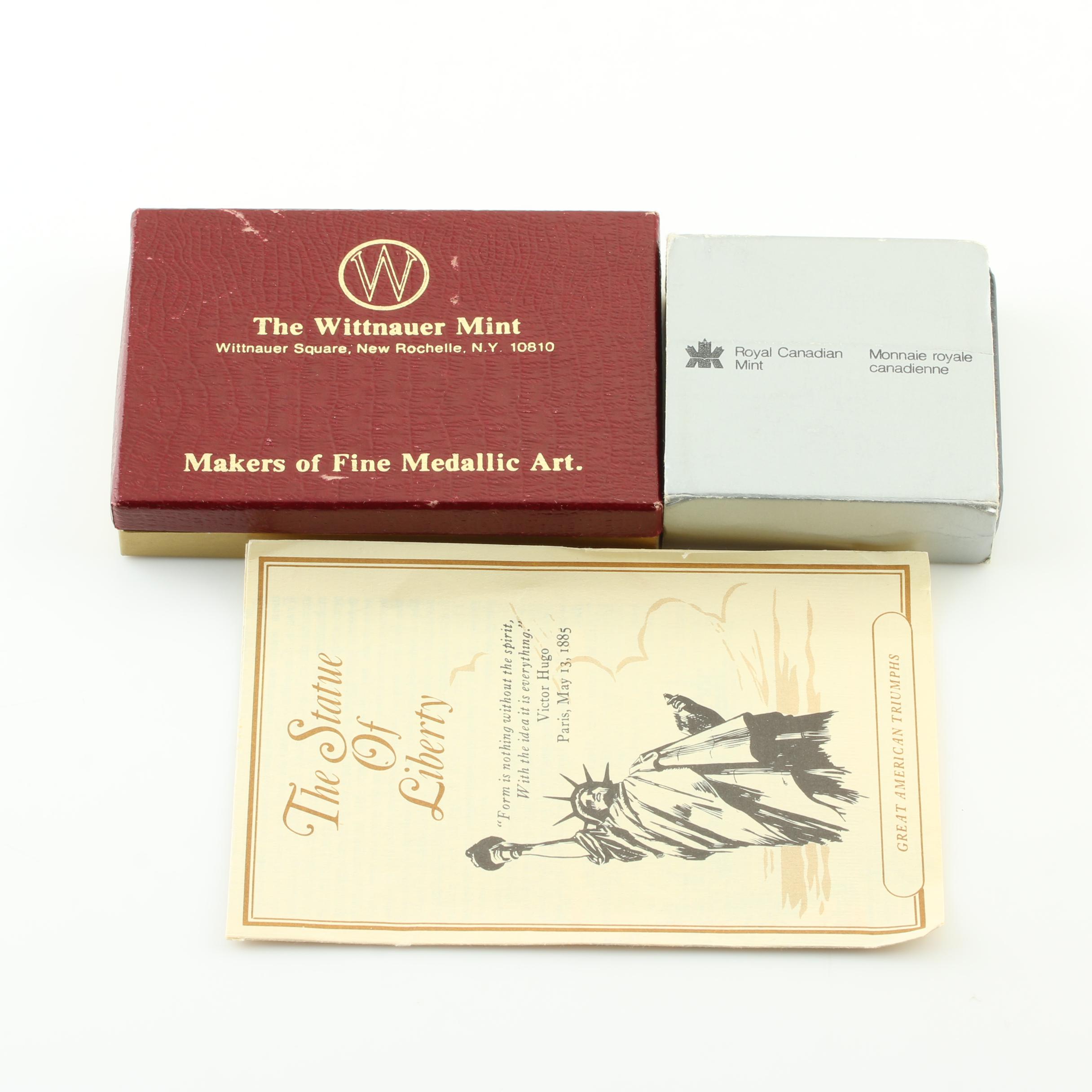 Commemorative Canadian Proof Silver Dollar and a Statue of Liberty Silver Medal