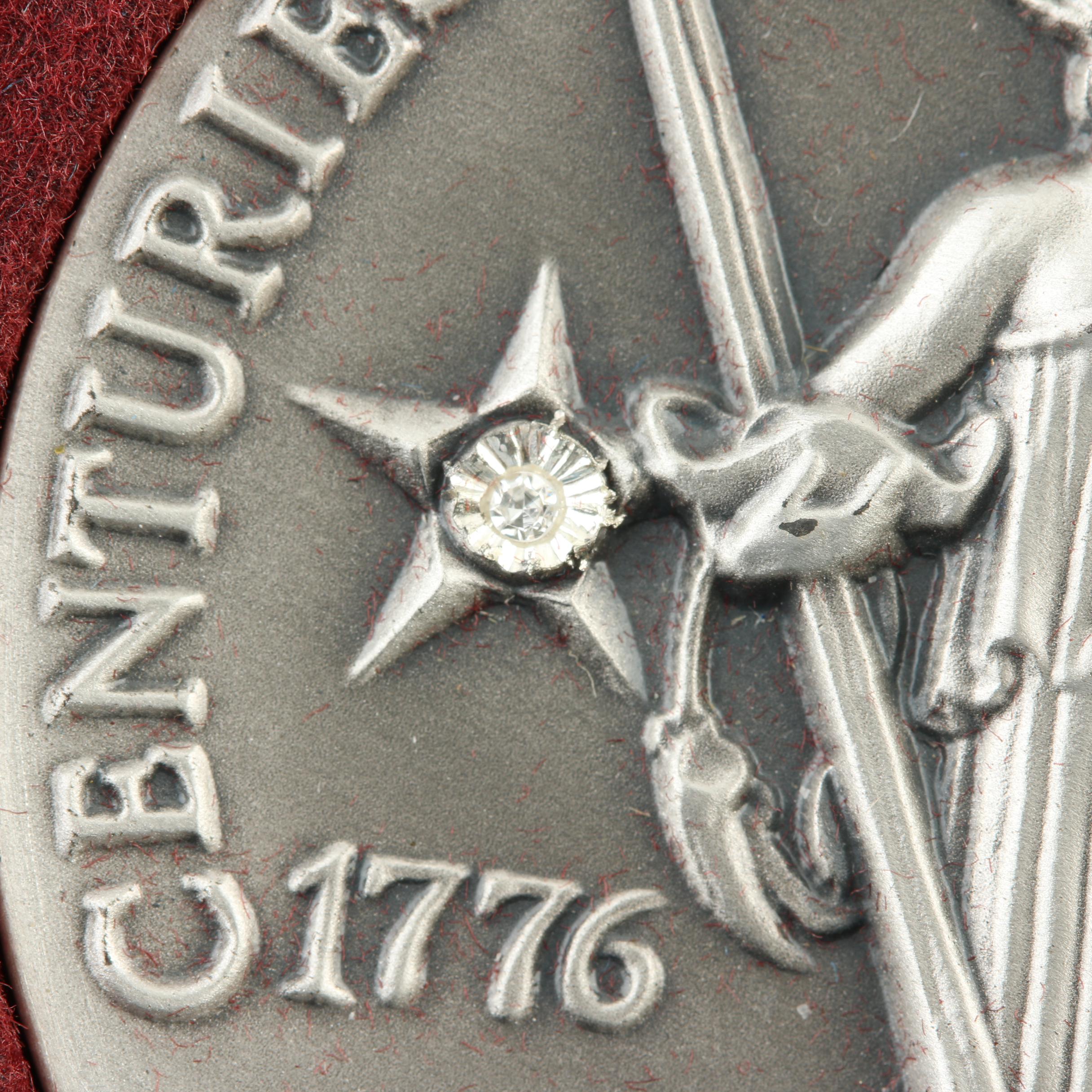 Commemorative Canadian Proof Silver Dollar and a Statue of Liberty Silver Medal