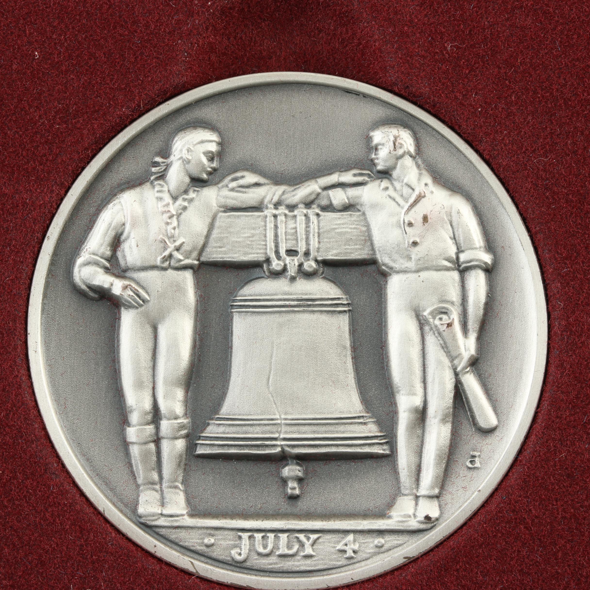 Commemorative Canadian Proof Silver Dollar and a Statue of Liberty Silver Medal