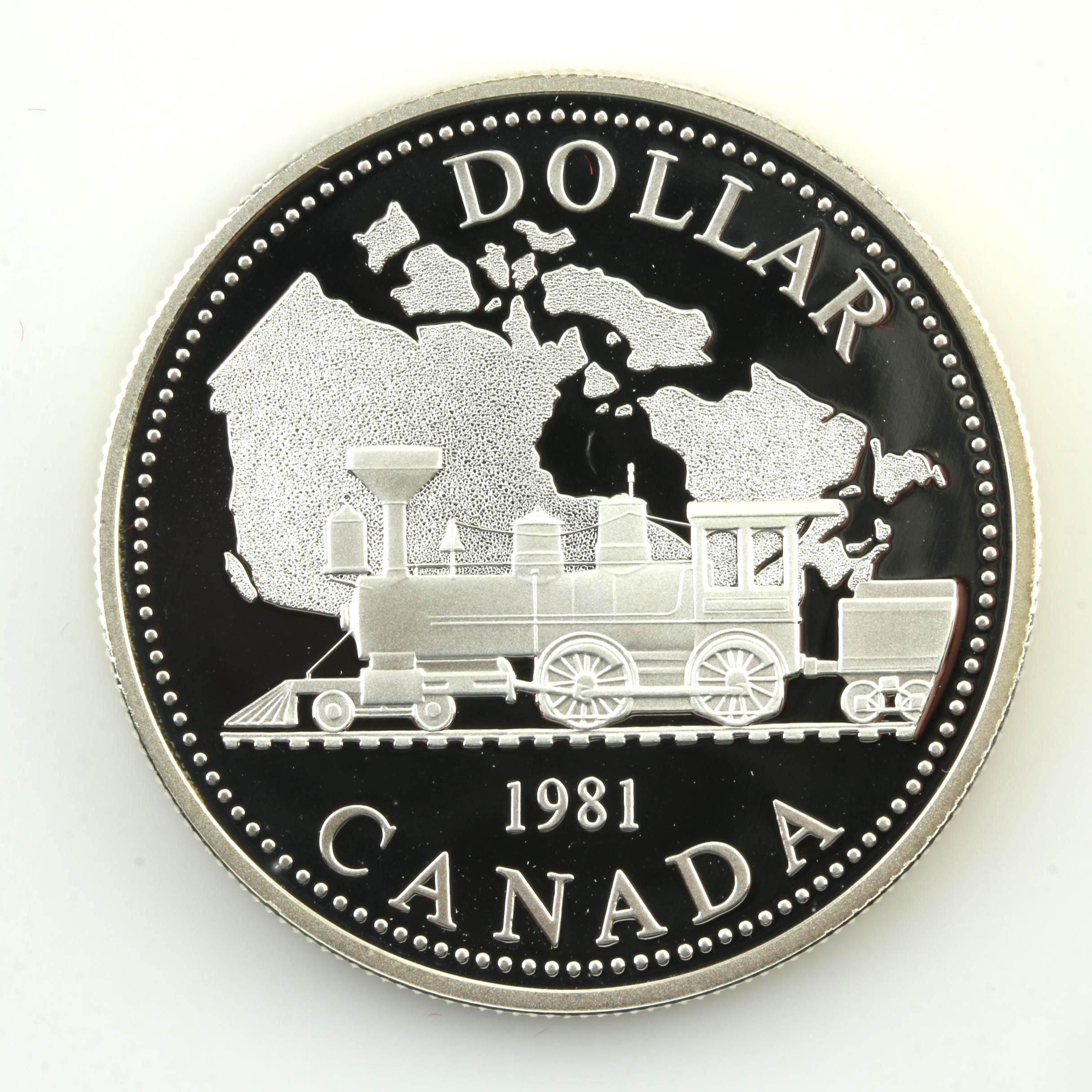 Commemorative Canadian Proof Silver Dollar and a Statue of Liberty Silver Medal