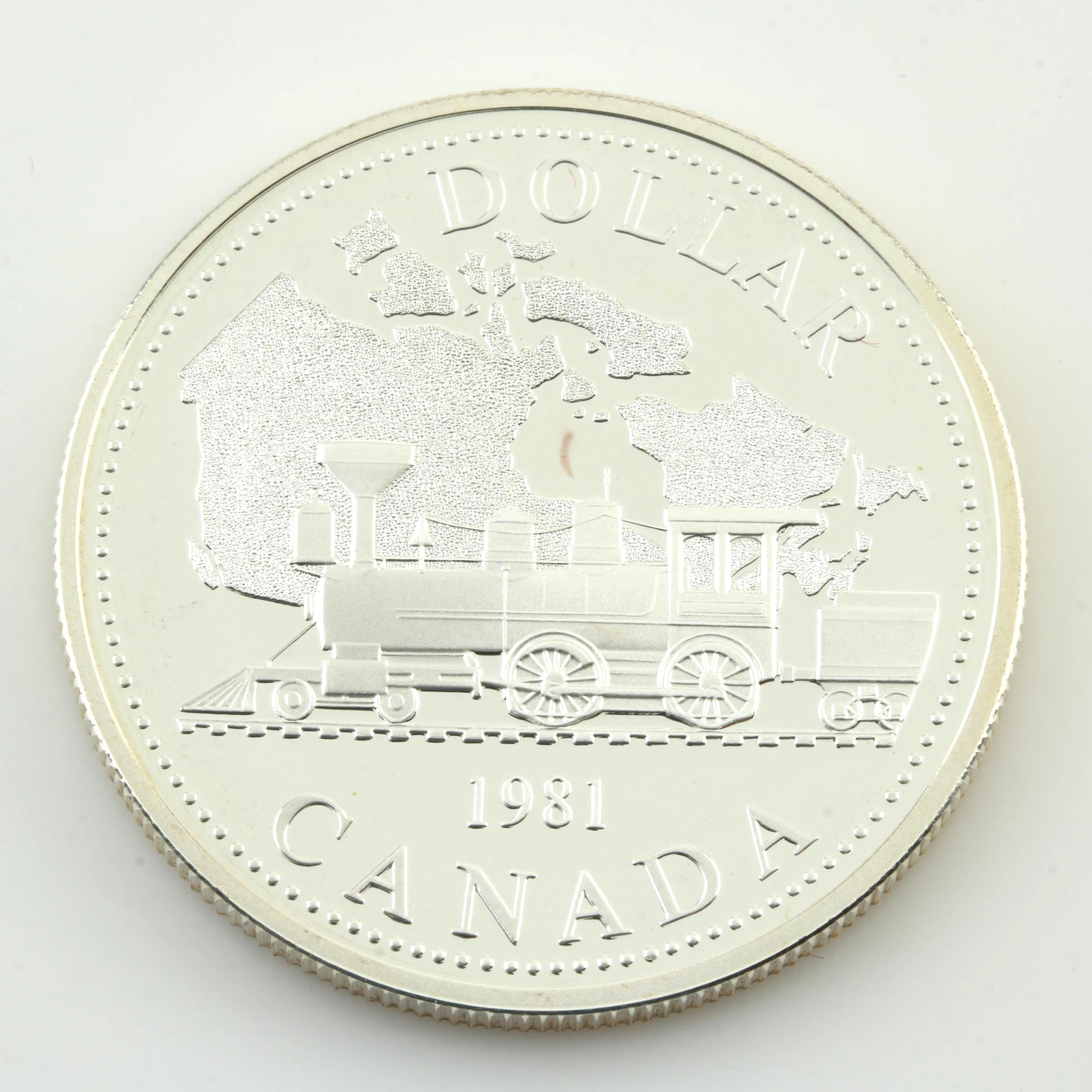 Commemorative Canadian Proof Silver Dollar and a Statue of Liberty Silver Medal