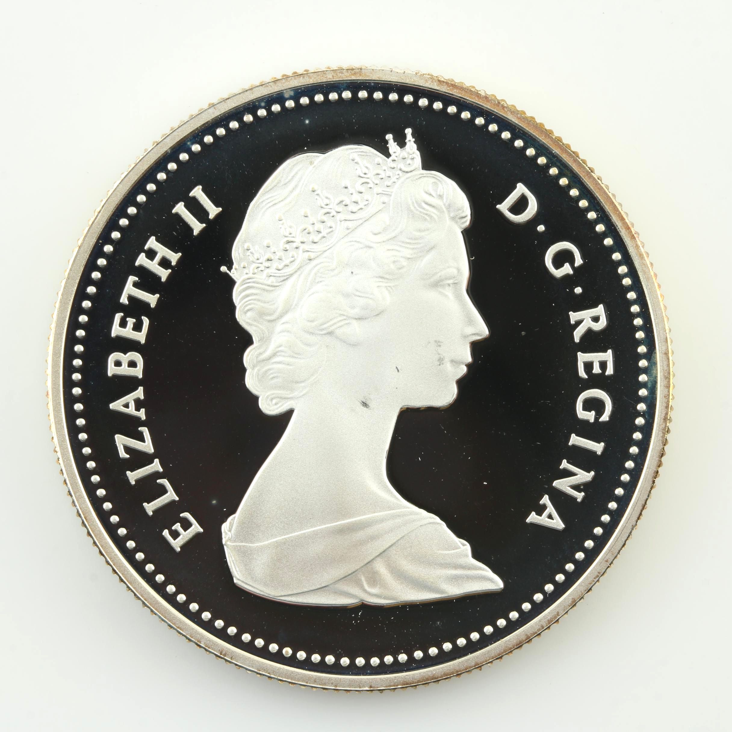 Commemorative Canadian Proof Silver Dollar and a Statue of Liberty Silver Medal