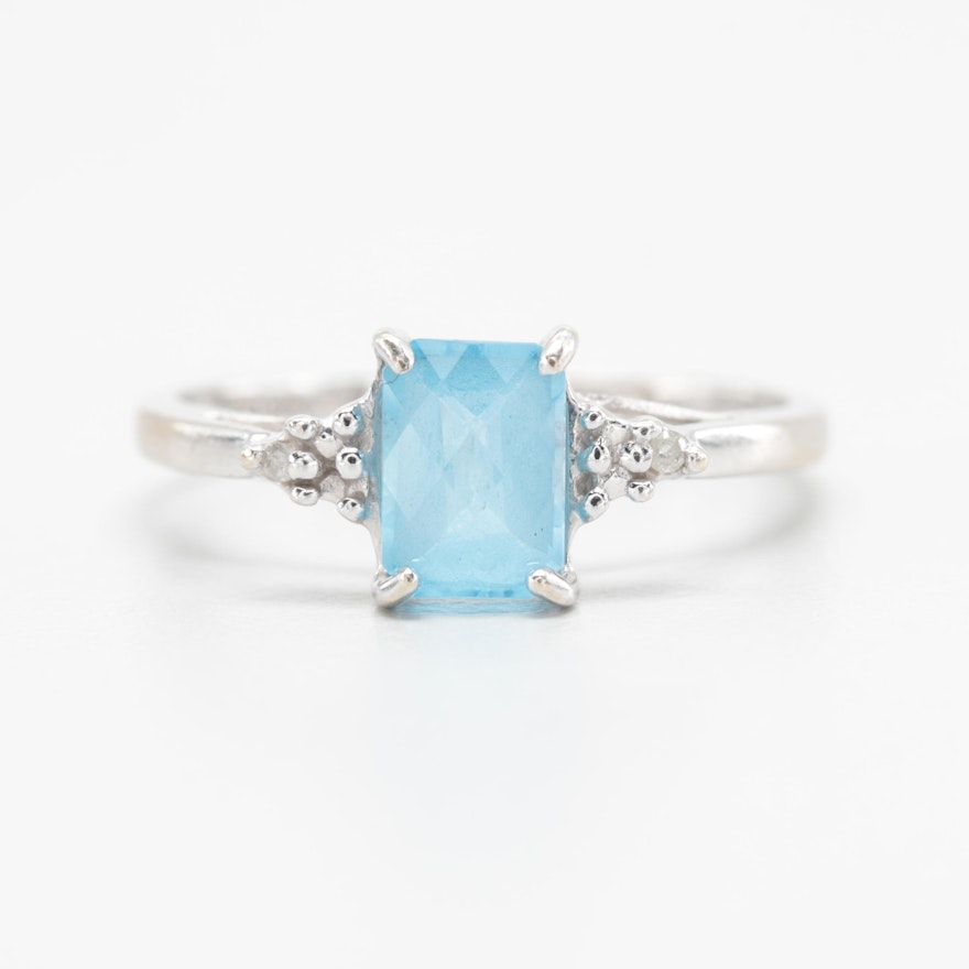 10K White Gold Blue Topaz and Diamond Ring.