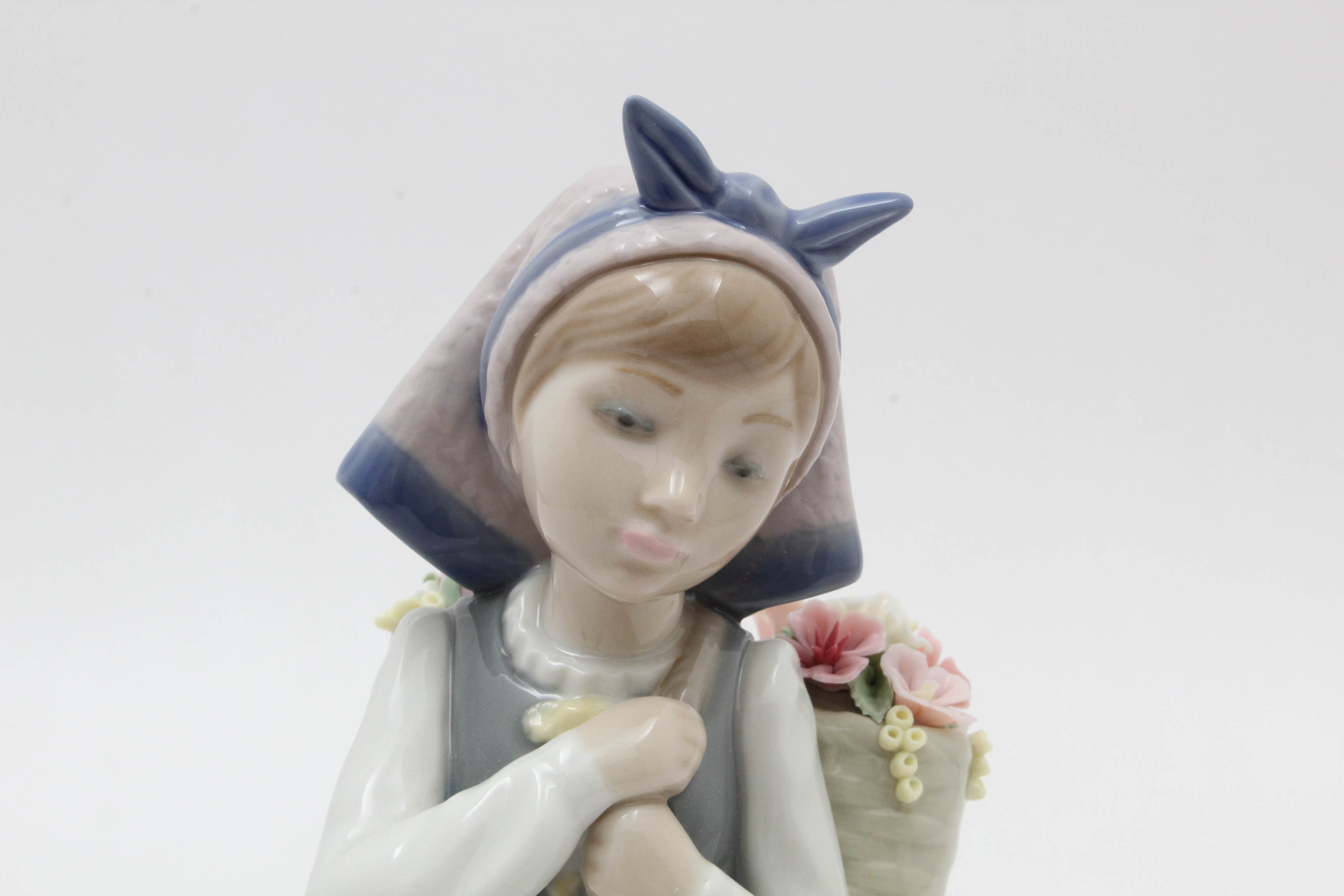 Lladró Hand-Painted Porcelain Figurine of Girl with Flower Basket