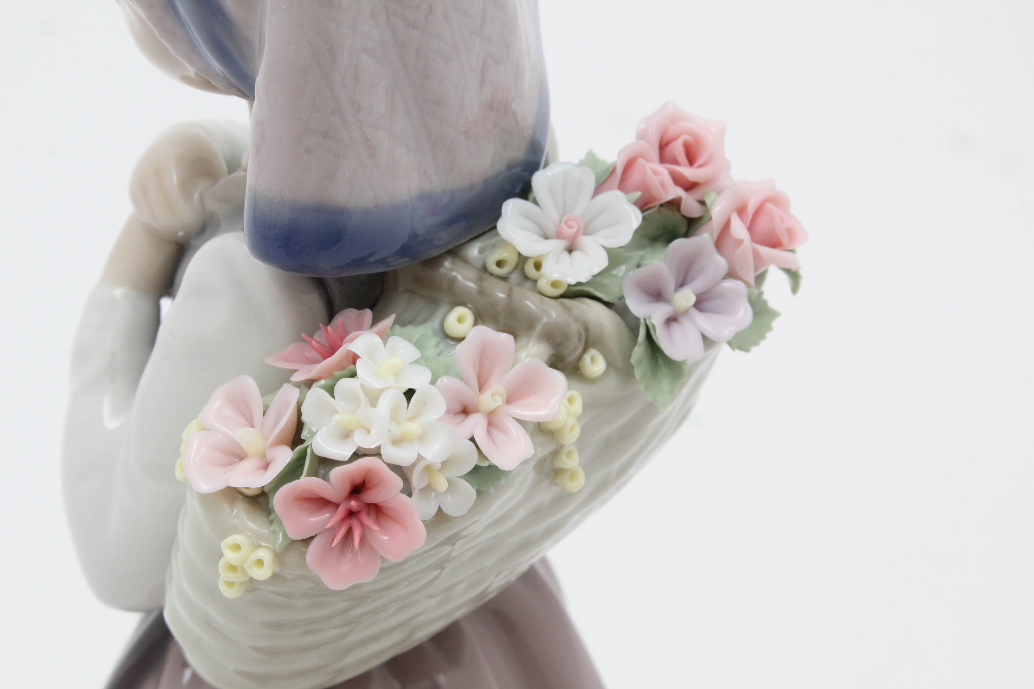 Lladró Hand-Painted Porcelain Figurine of Girl with Flower Basket