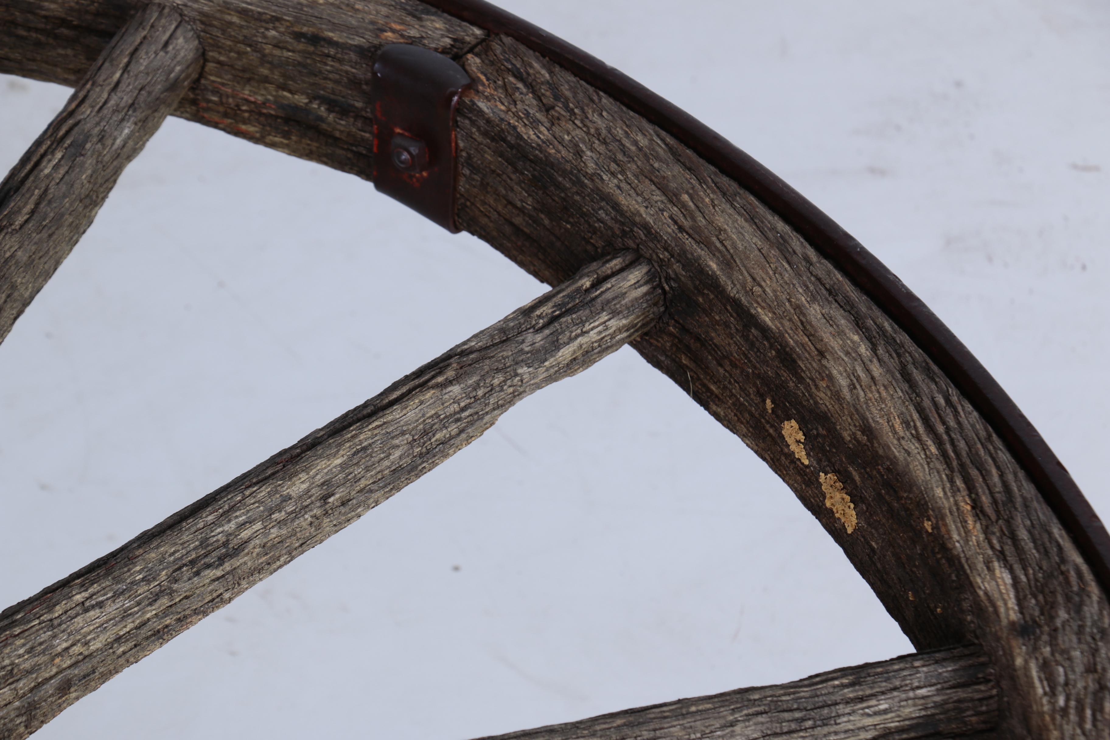 Custom-Made Coffee Table with Glass Top and Antique Iron and Wood Wagon Wheel