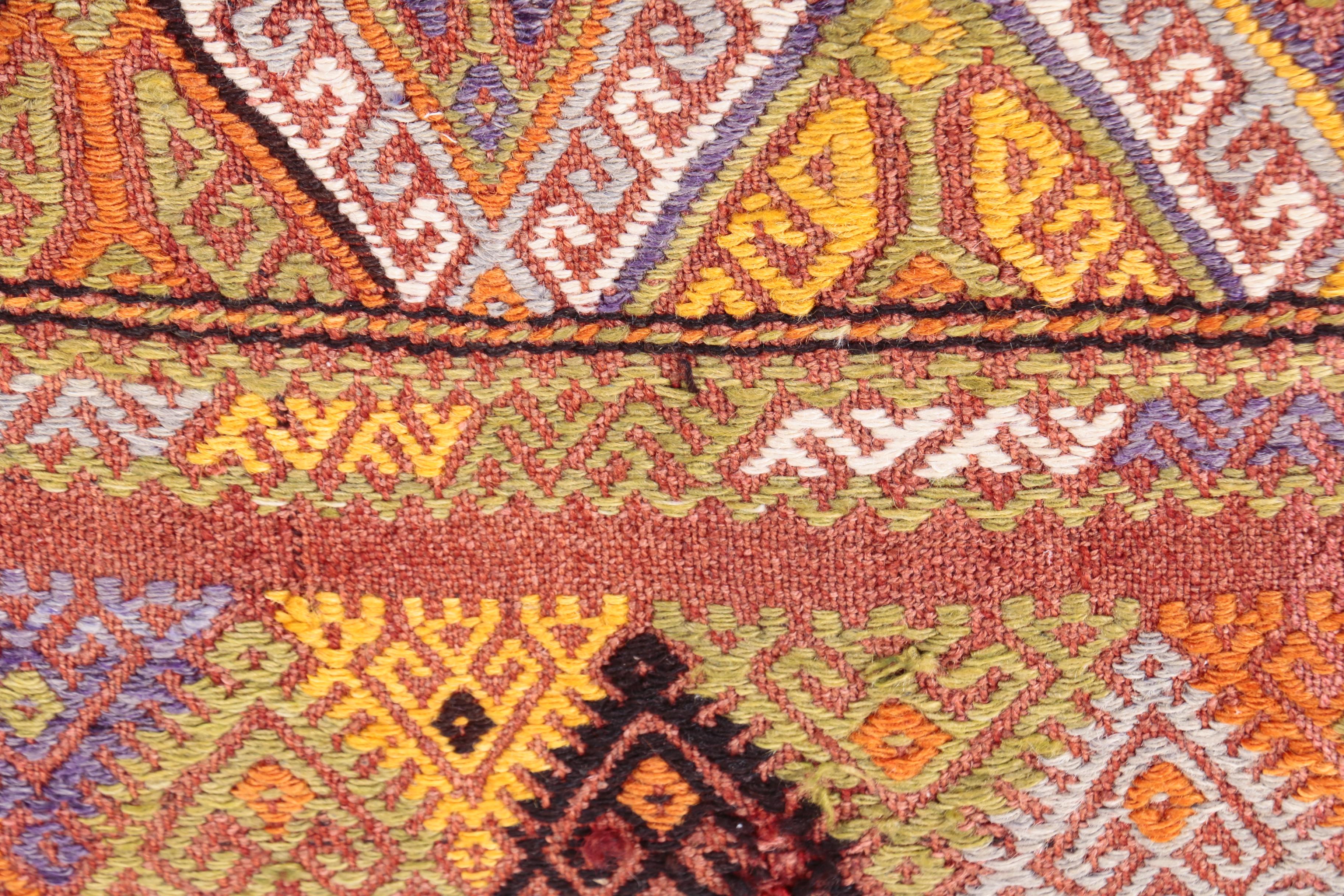 Three Leather and Kilim Upholstered Dining Chairs