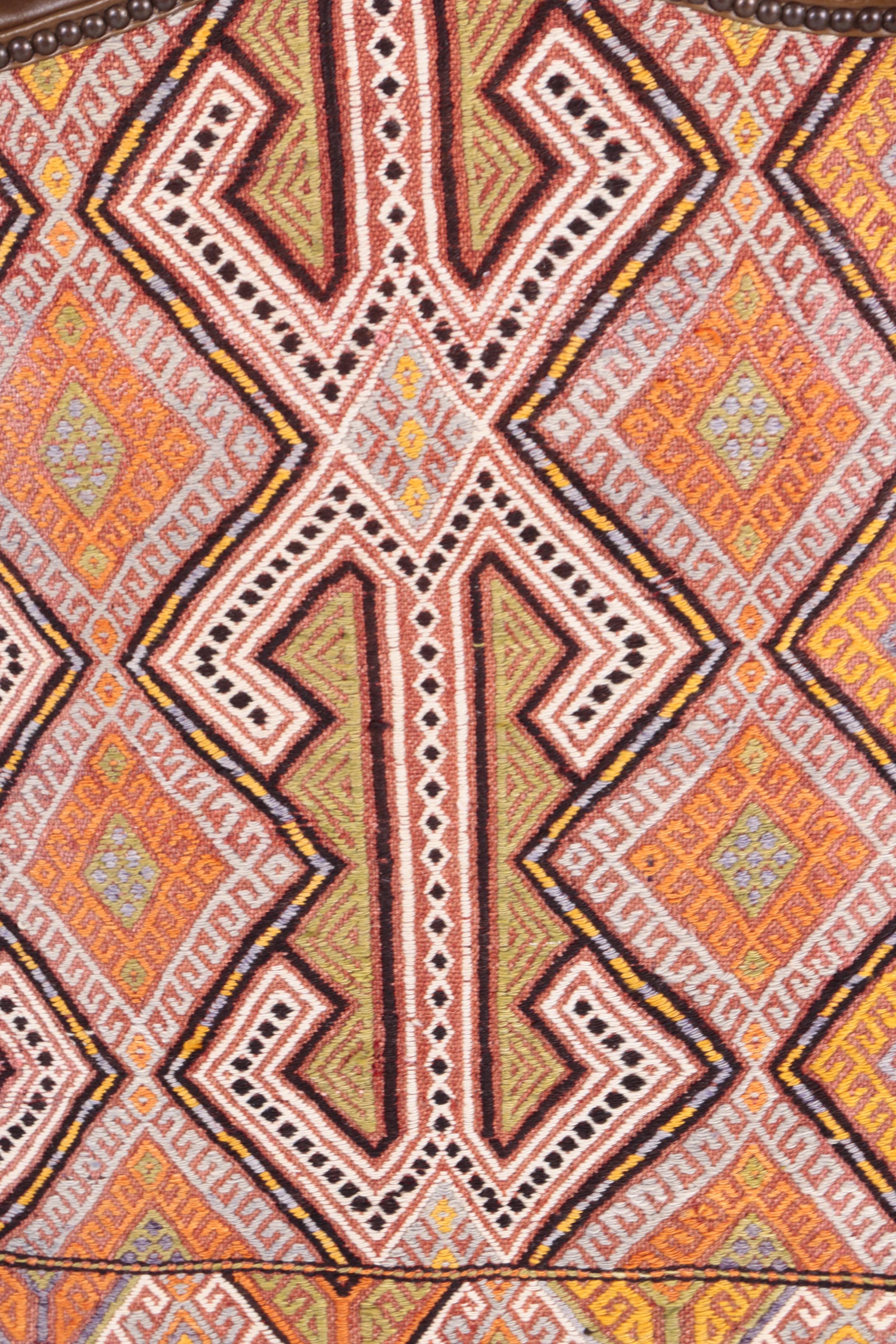 Three Leather and Kilim Upholstered Dining Chairs