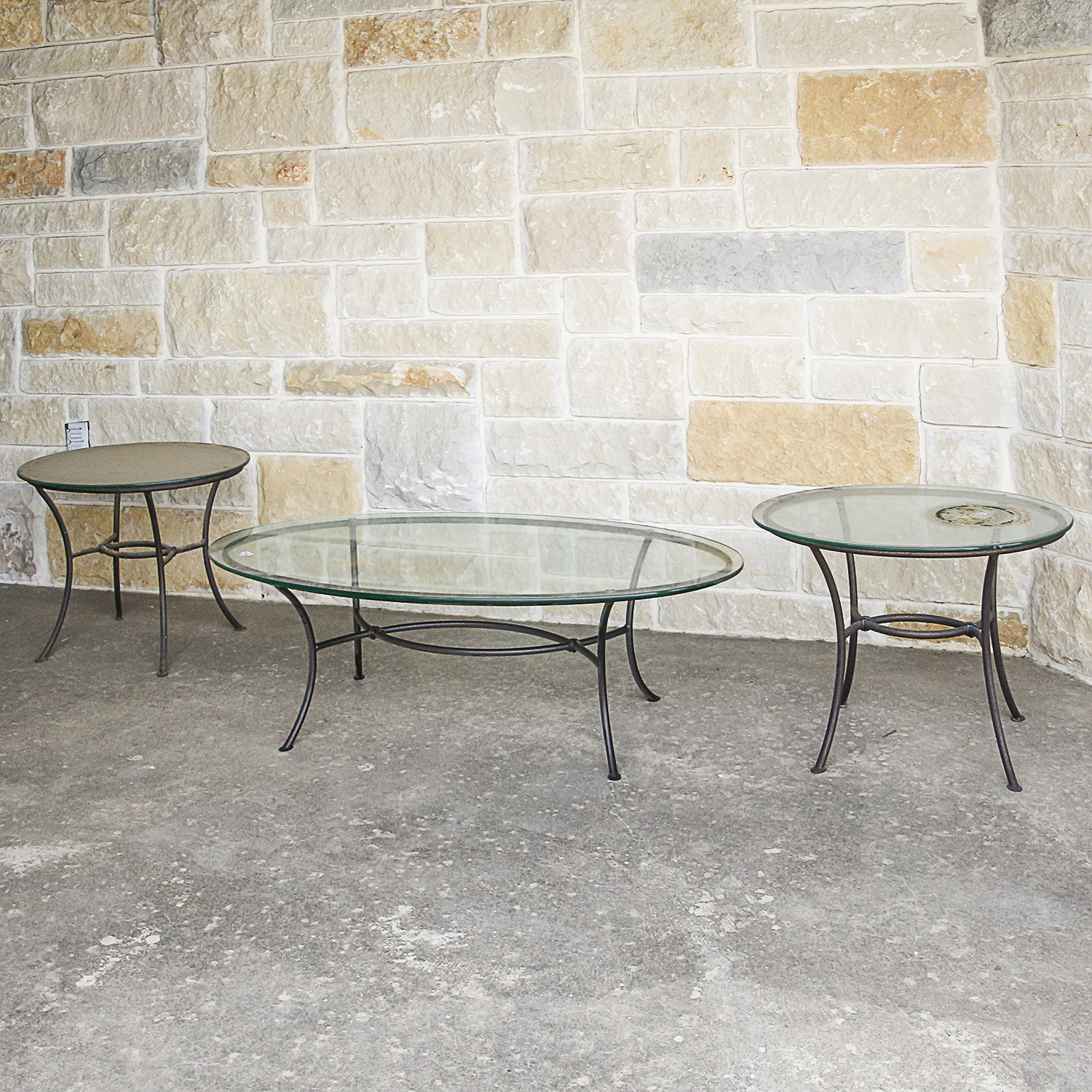 Three Glass Top Metal Patio Tables