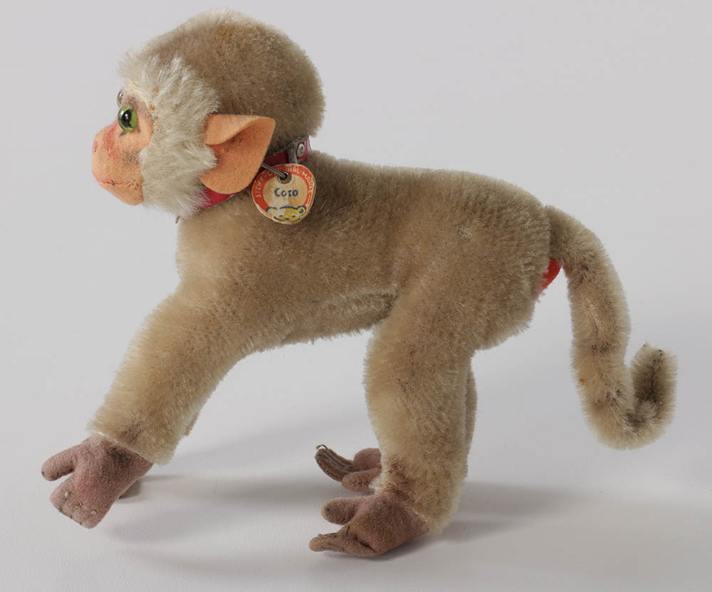 Vintage Steiff "Coco" Baboon and R. Dakin Leopard Stuffed Animals