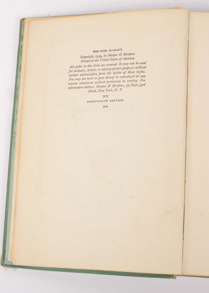 Collection of Vintage Books with Stand