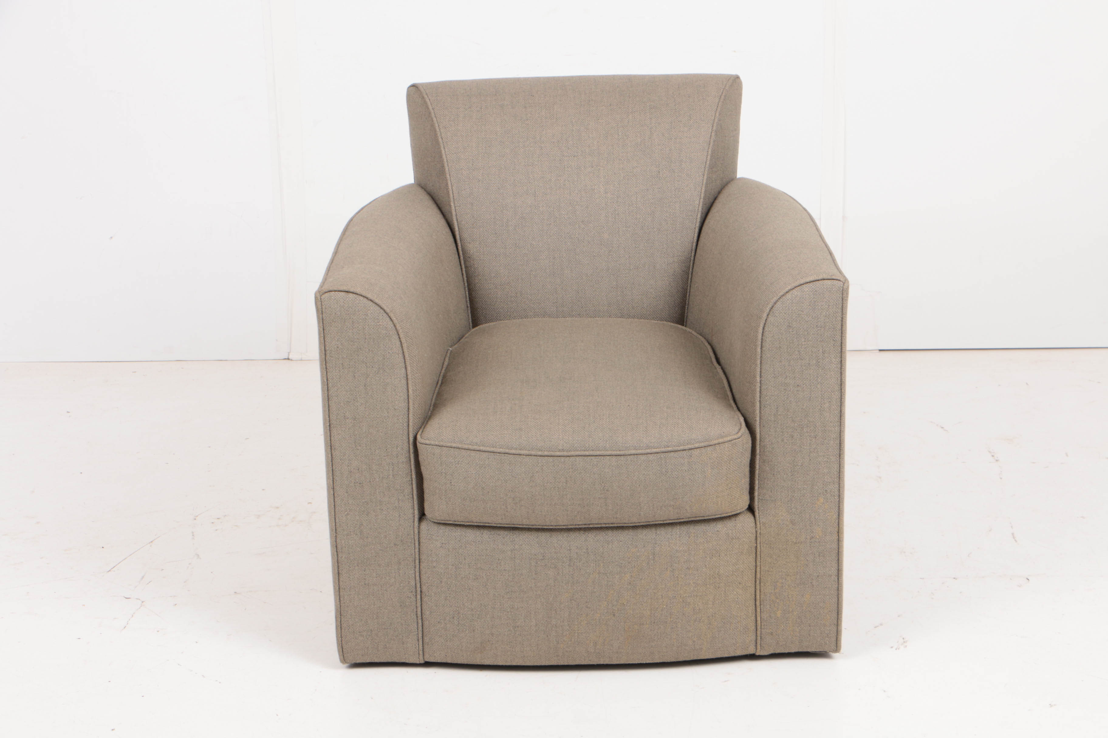 Pair of Donghia "Noble" Swivel Chairs and Ottoman