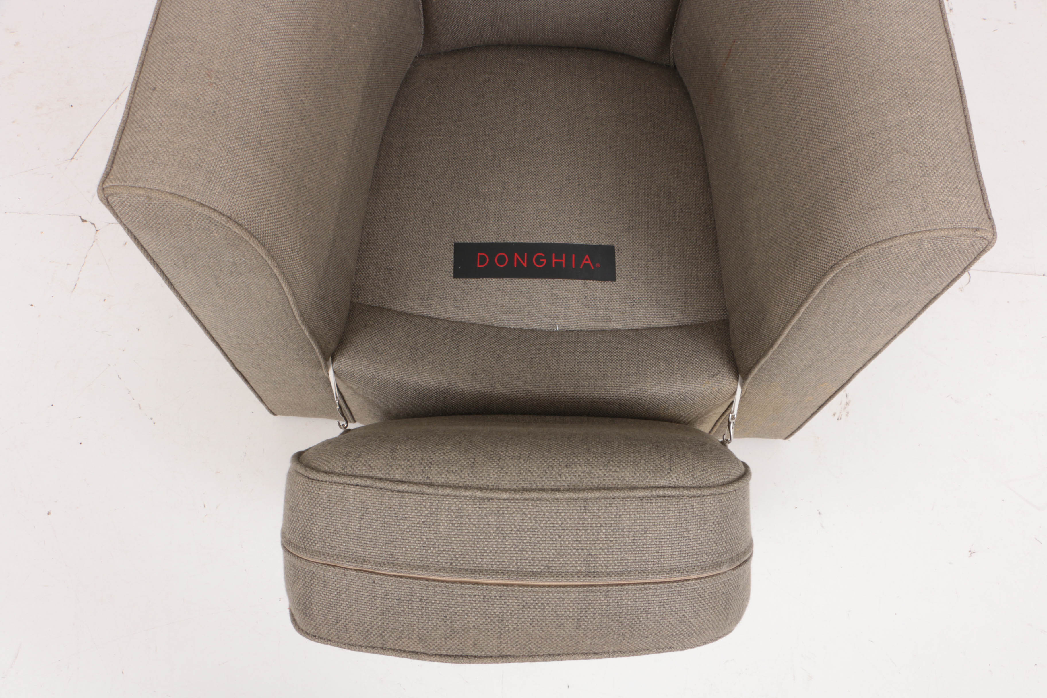 Pair of Donghia "Noble" Swivel Chairs and Ottoman