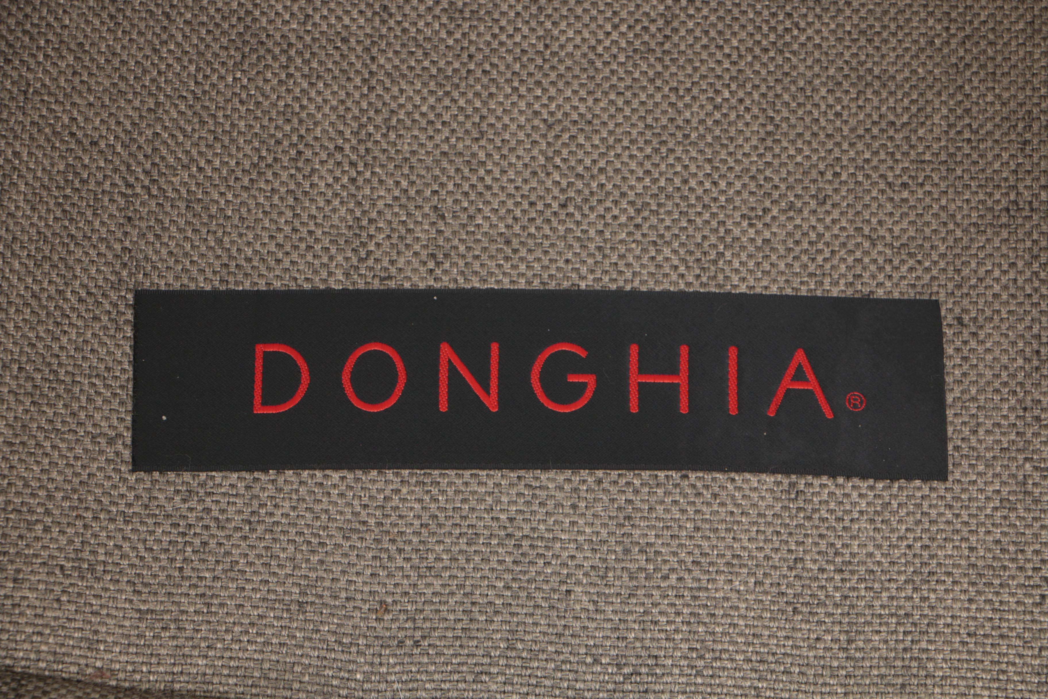 Pair of Donghia "Noble" Swivel Chairs and Ottoman