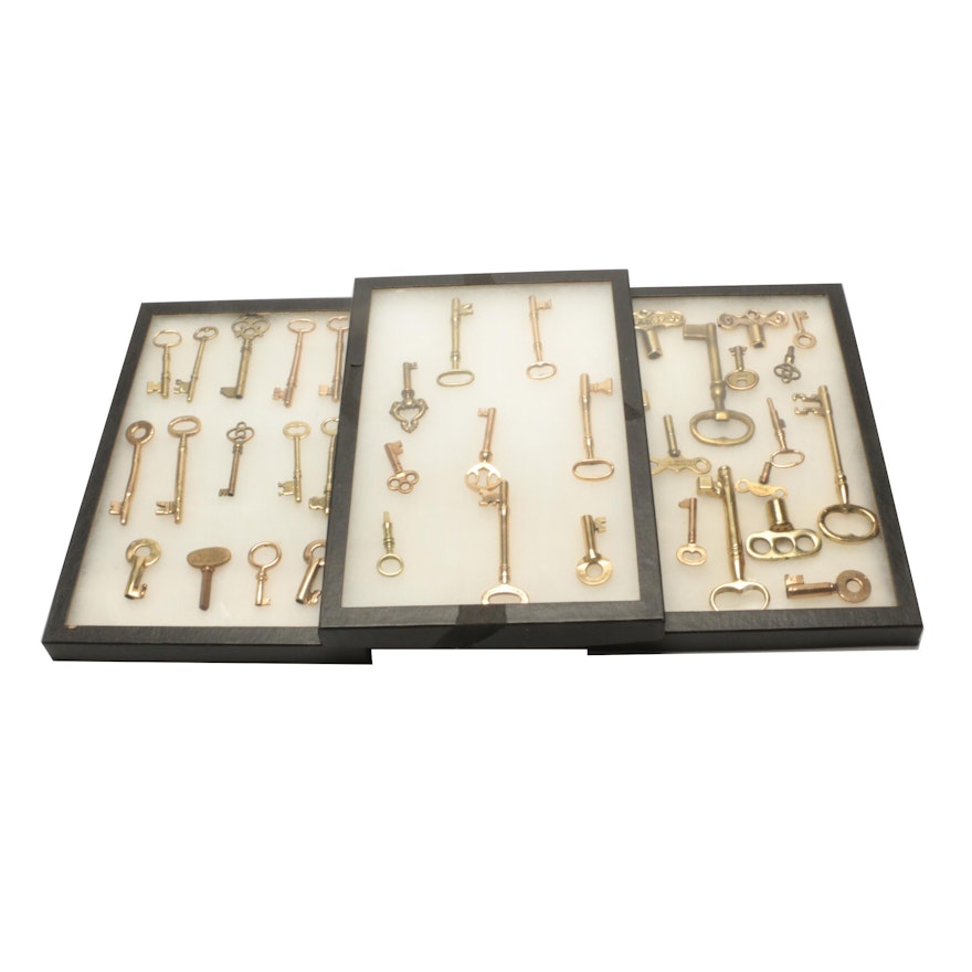 Gold Tone and Brass Key Assortment in Display Cases