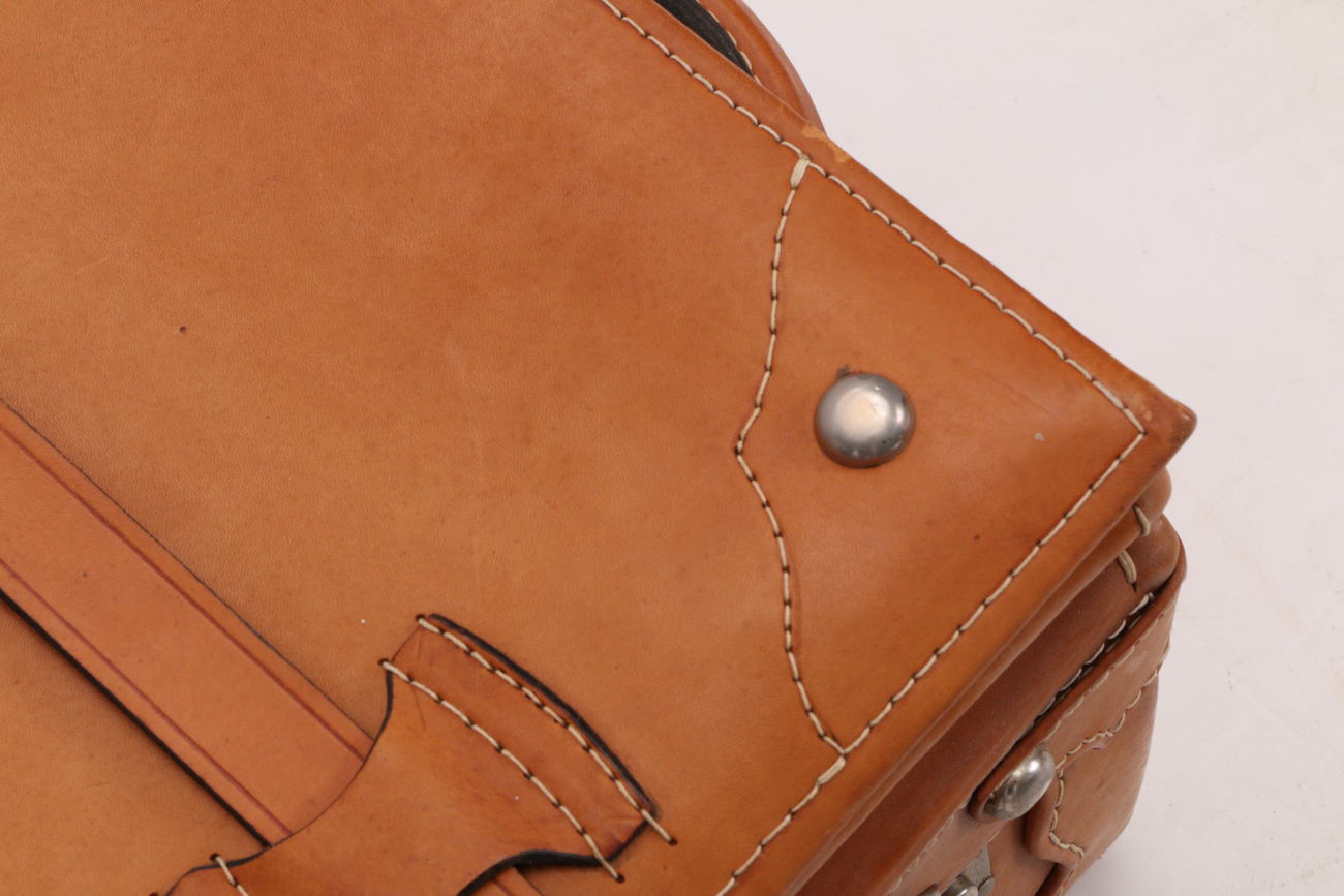 Vintage Leather Rolling Suitcase