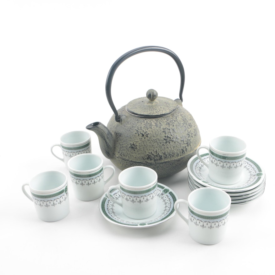 Chinese Cast Iron Teapot with Porcelain Flat Cups and Saucers