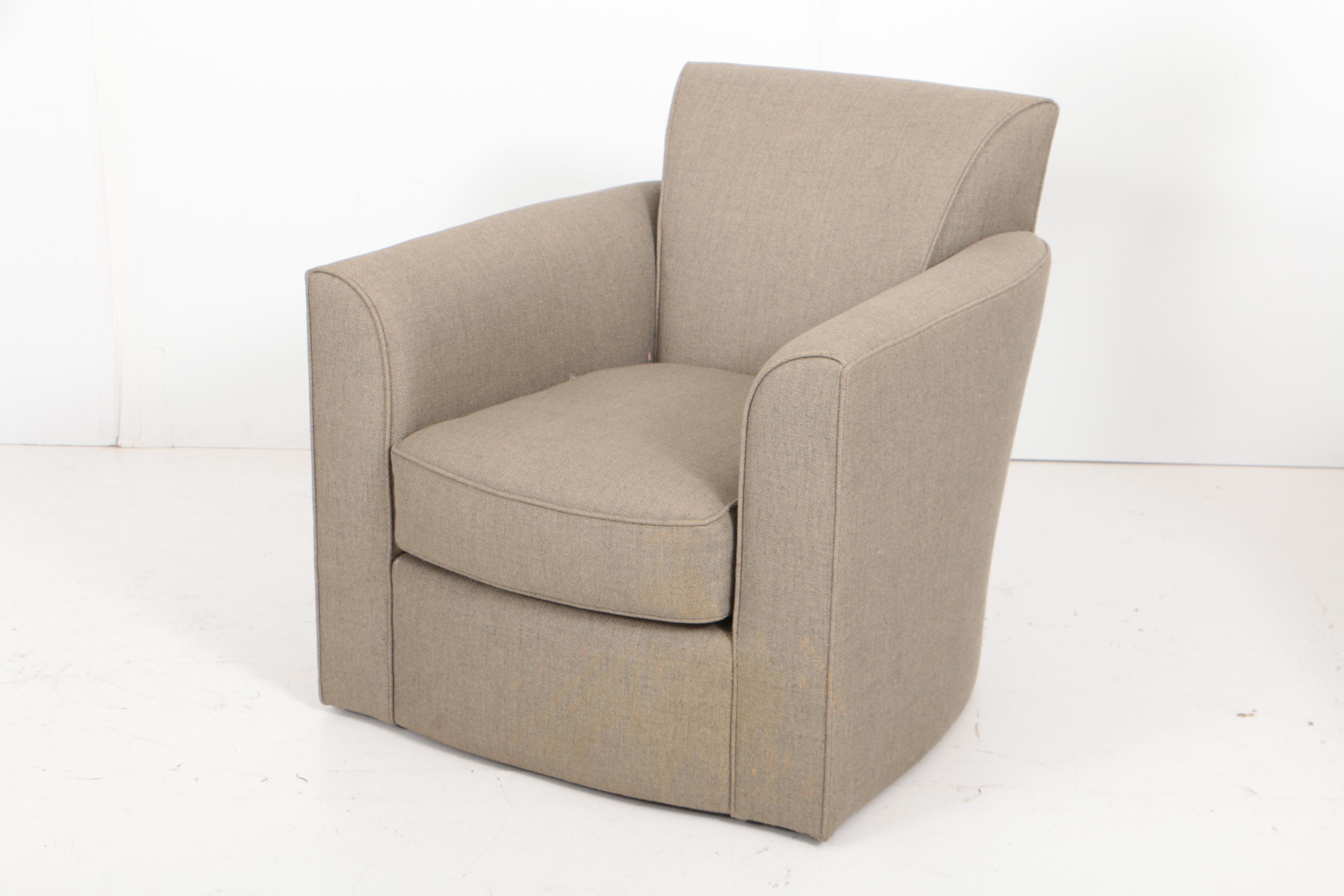 Pair of Donghia "Noble" Swivel Chairs and Ottoman