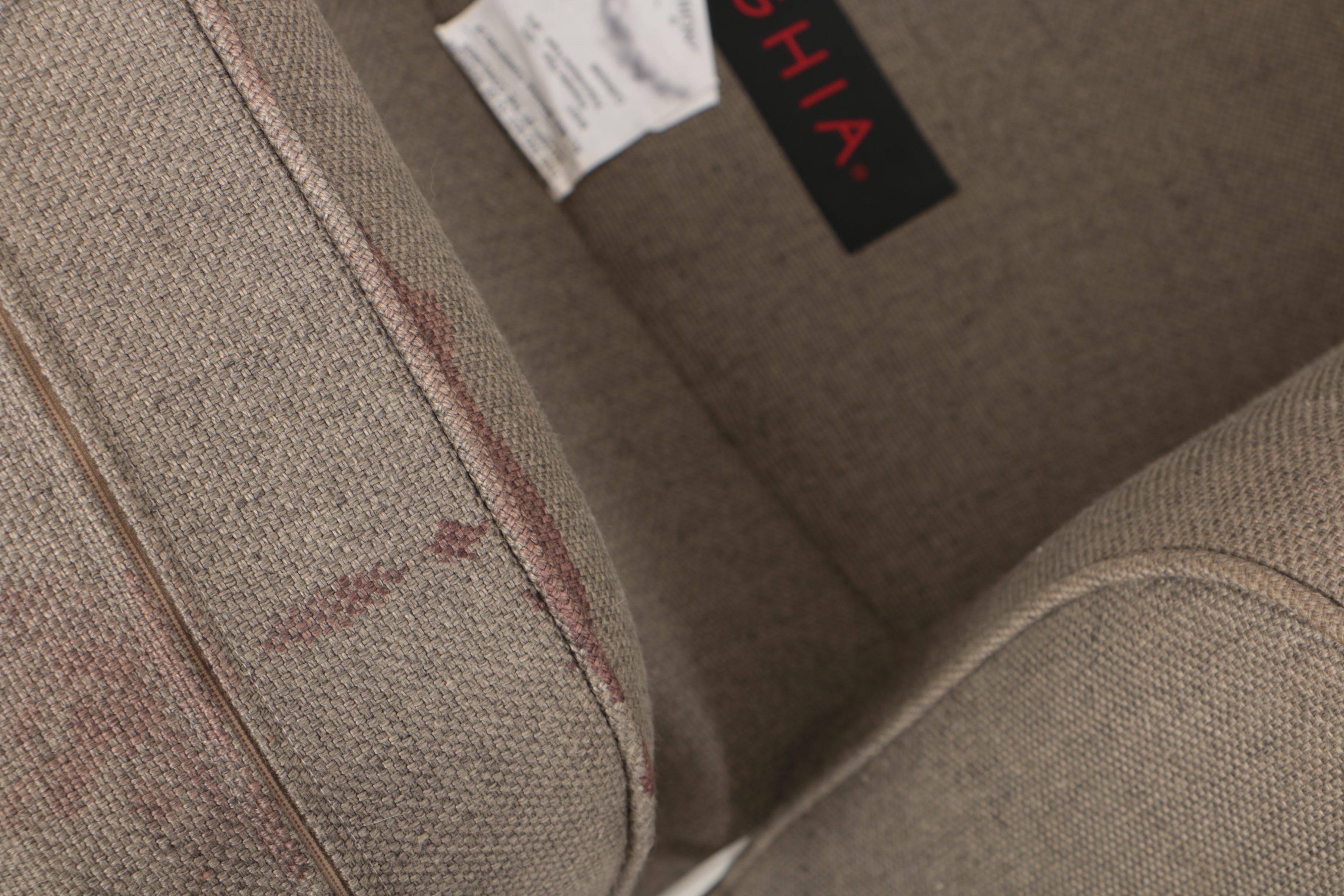 Pair of Donghia "Noble" Swivel Chairs and Ottoman