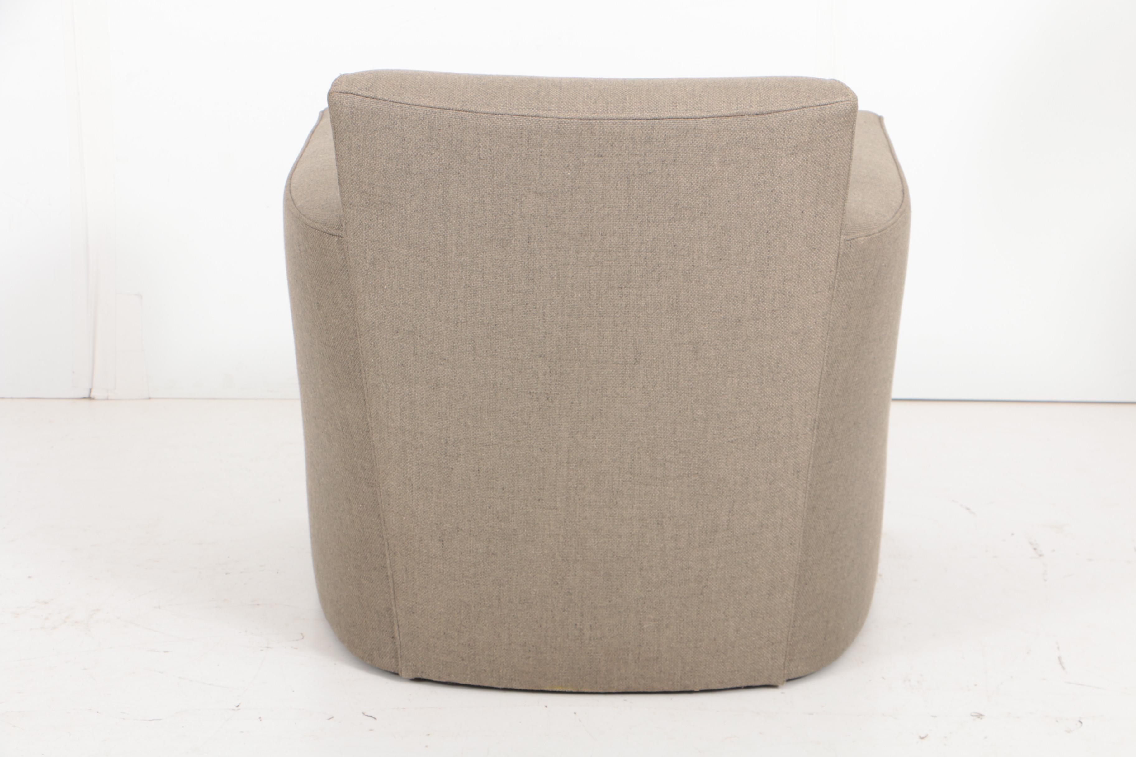 Pair of Donghia "Noble" Swivel Chairs and Ottoman