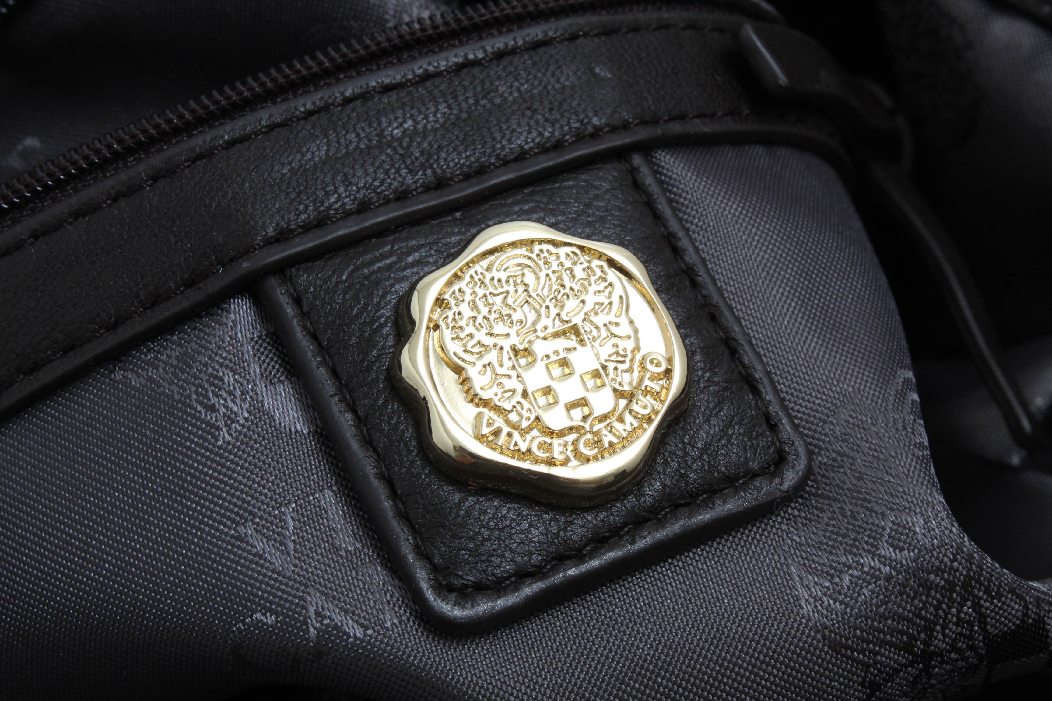 Tory Burch and Vince Camuto Handbags