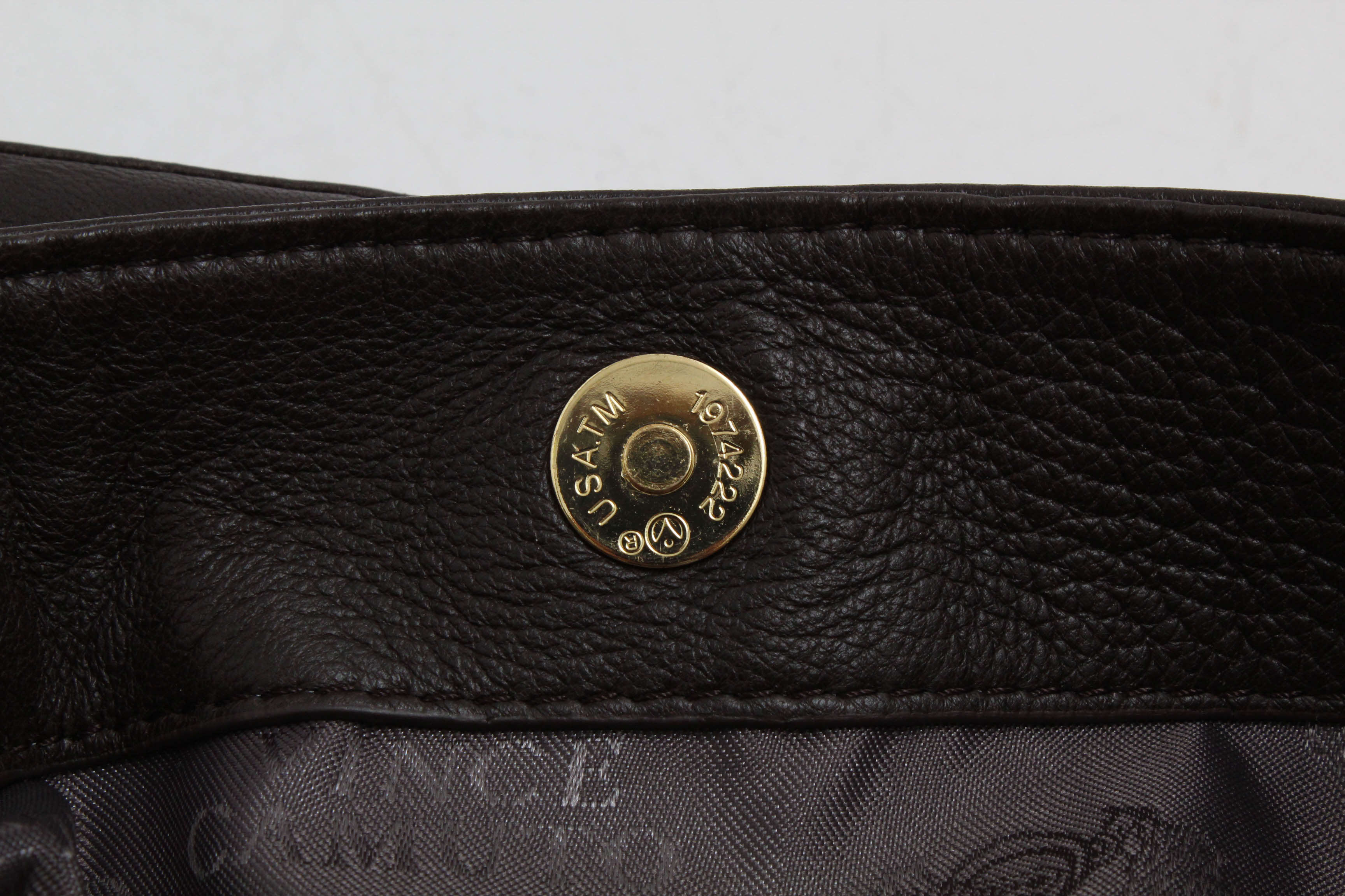 Tory Burch and Vince Camuto Handbags