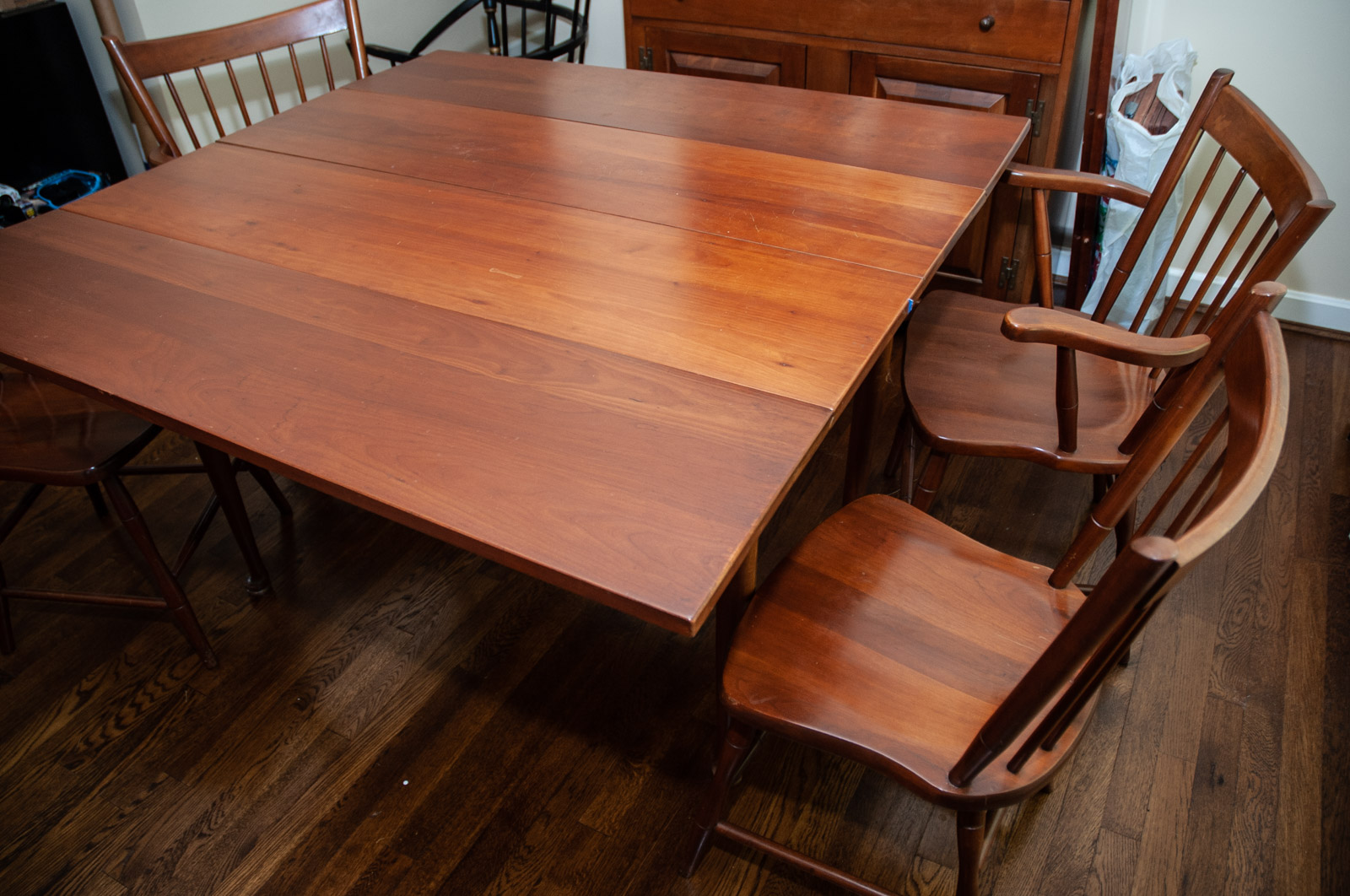 Walter of Wabash Cherry Drop Leaf Dining Table with Spindle Back Chairs