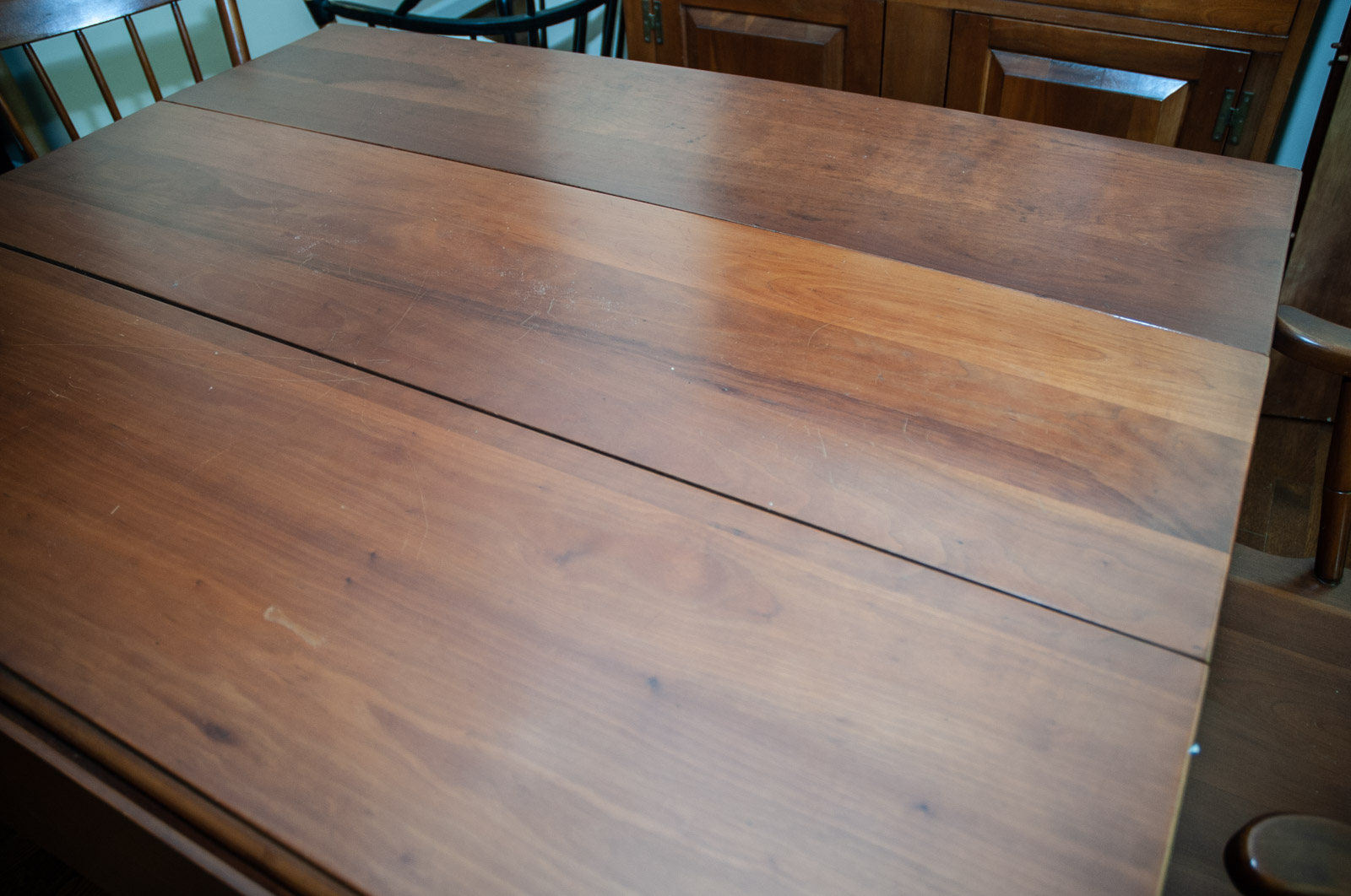 Walter of Wabash Cherry Drop Leaf Dining Table with Spindle Back Chairs