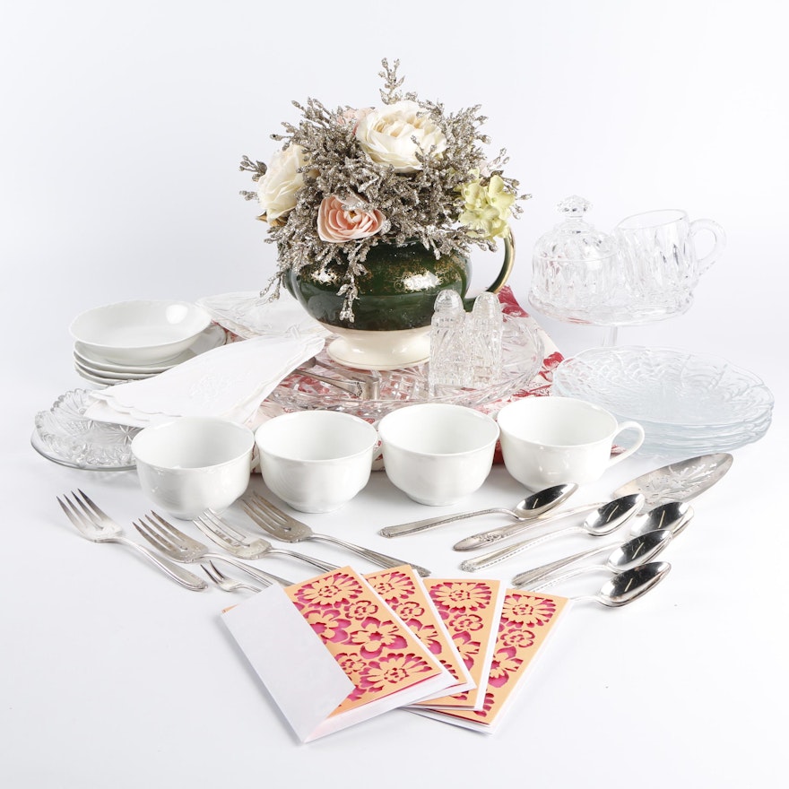 Ceramic and Glass Tableware with Flatware and Floral Centerpiece