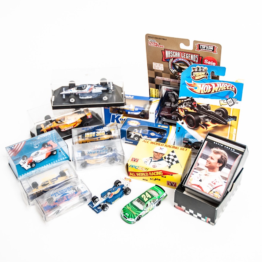 Auto Racing Memorabilia Including Cast Iron Cars and Trading Cards