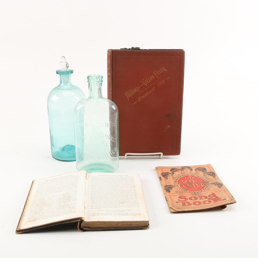 Vintage Glass Bottles and Antique Books