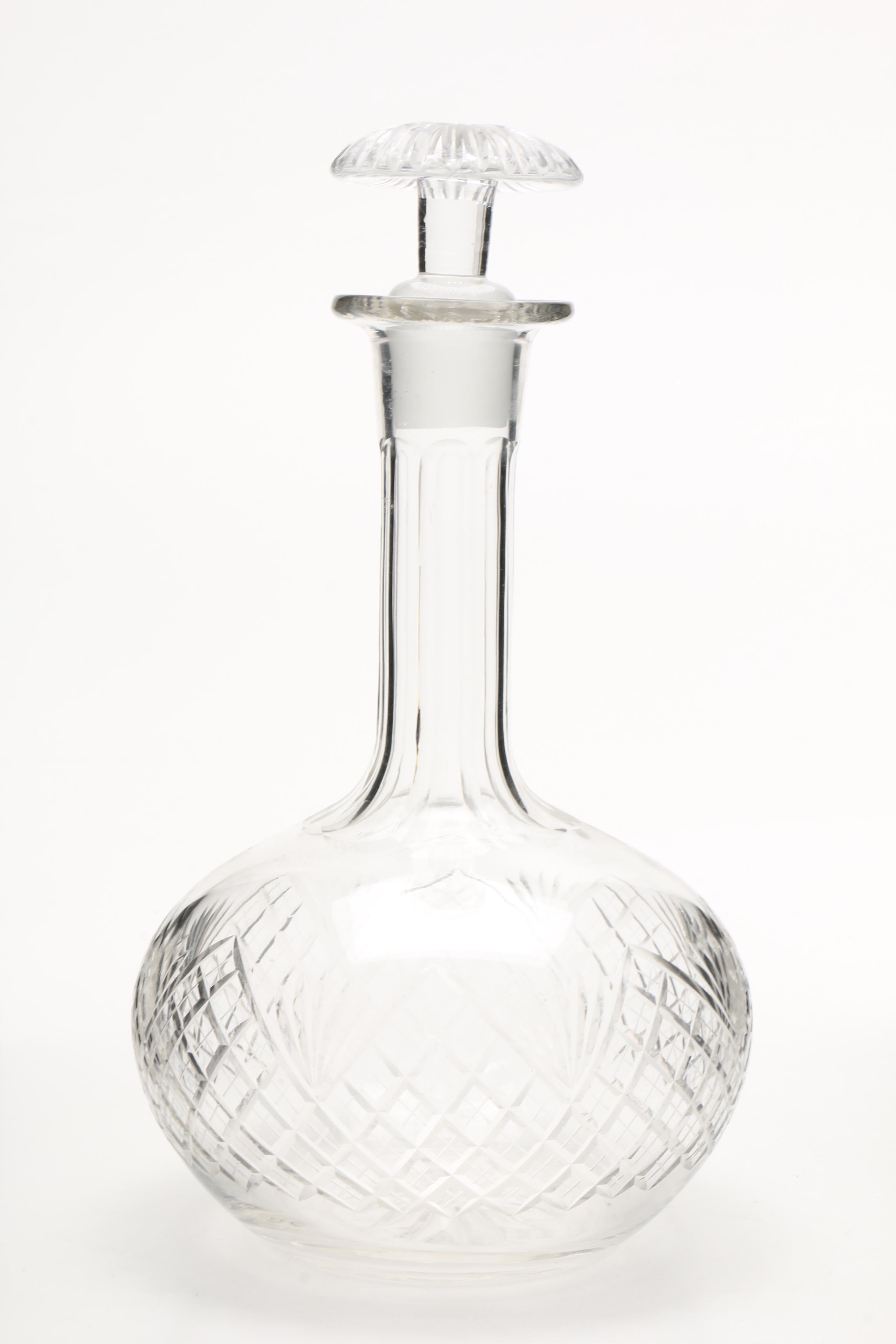 Four Cut and Molded Glass Decanters and Stoppers, 20th Century