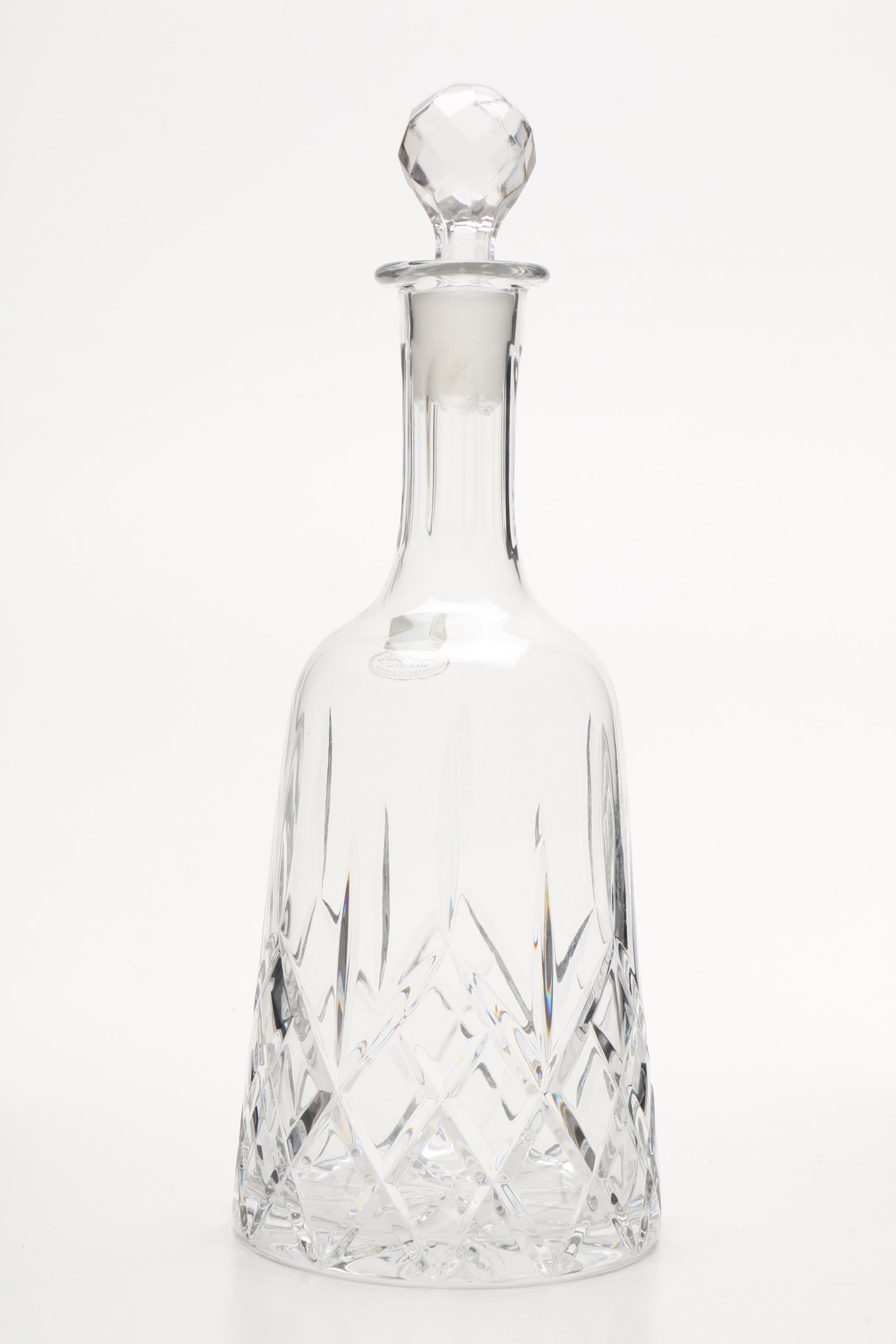 Four Cut and Molded Glass Decanters and Stoppers, 20th Century