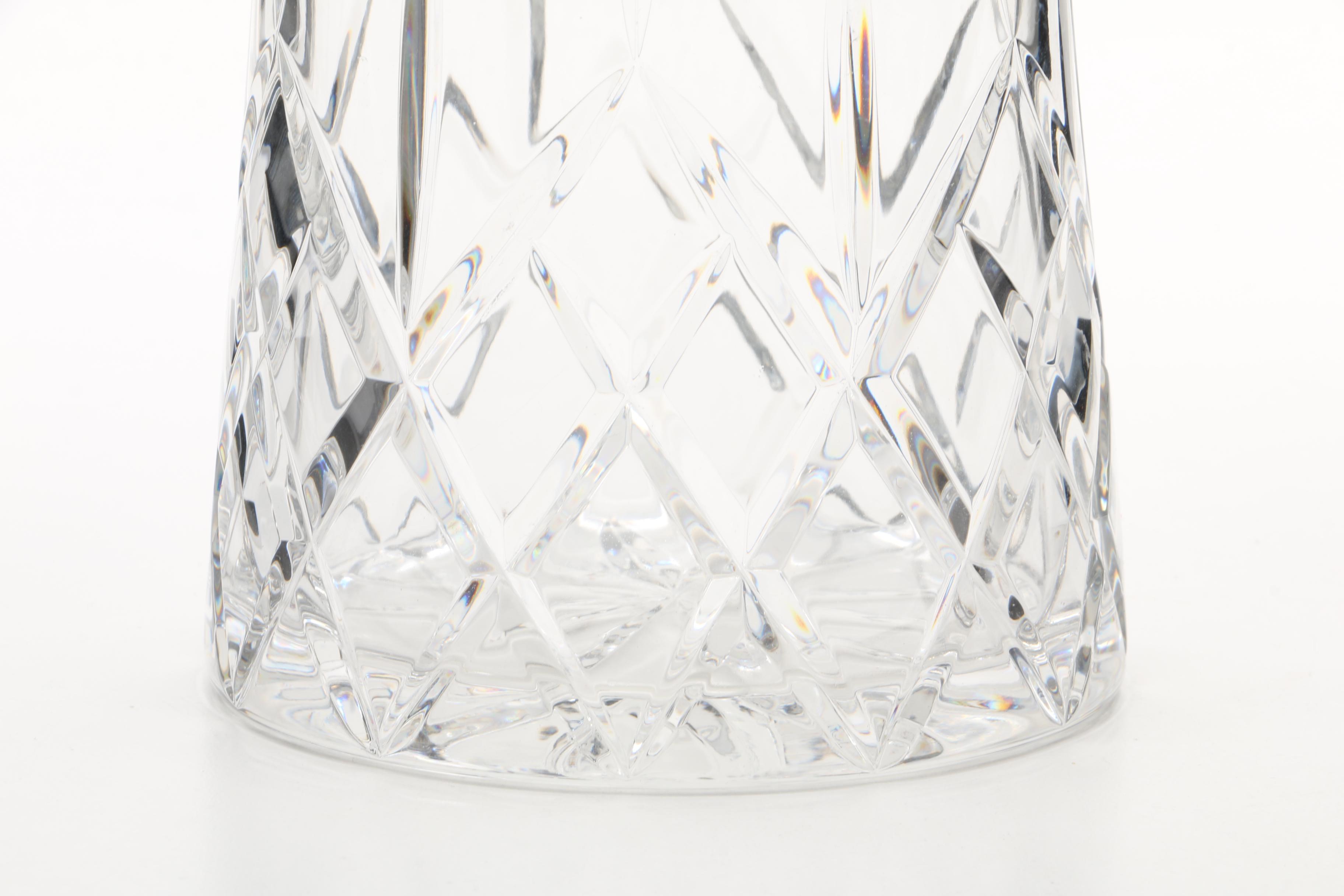 Four Cut and Molded Glass Decanters and Stoppers, 20th Century