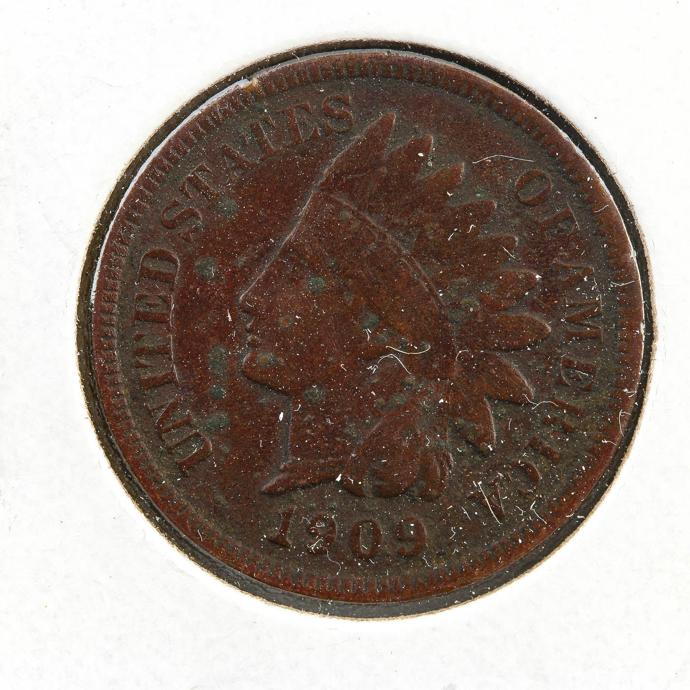 Five Indian Head Cents, Including an 1870 Cent